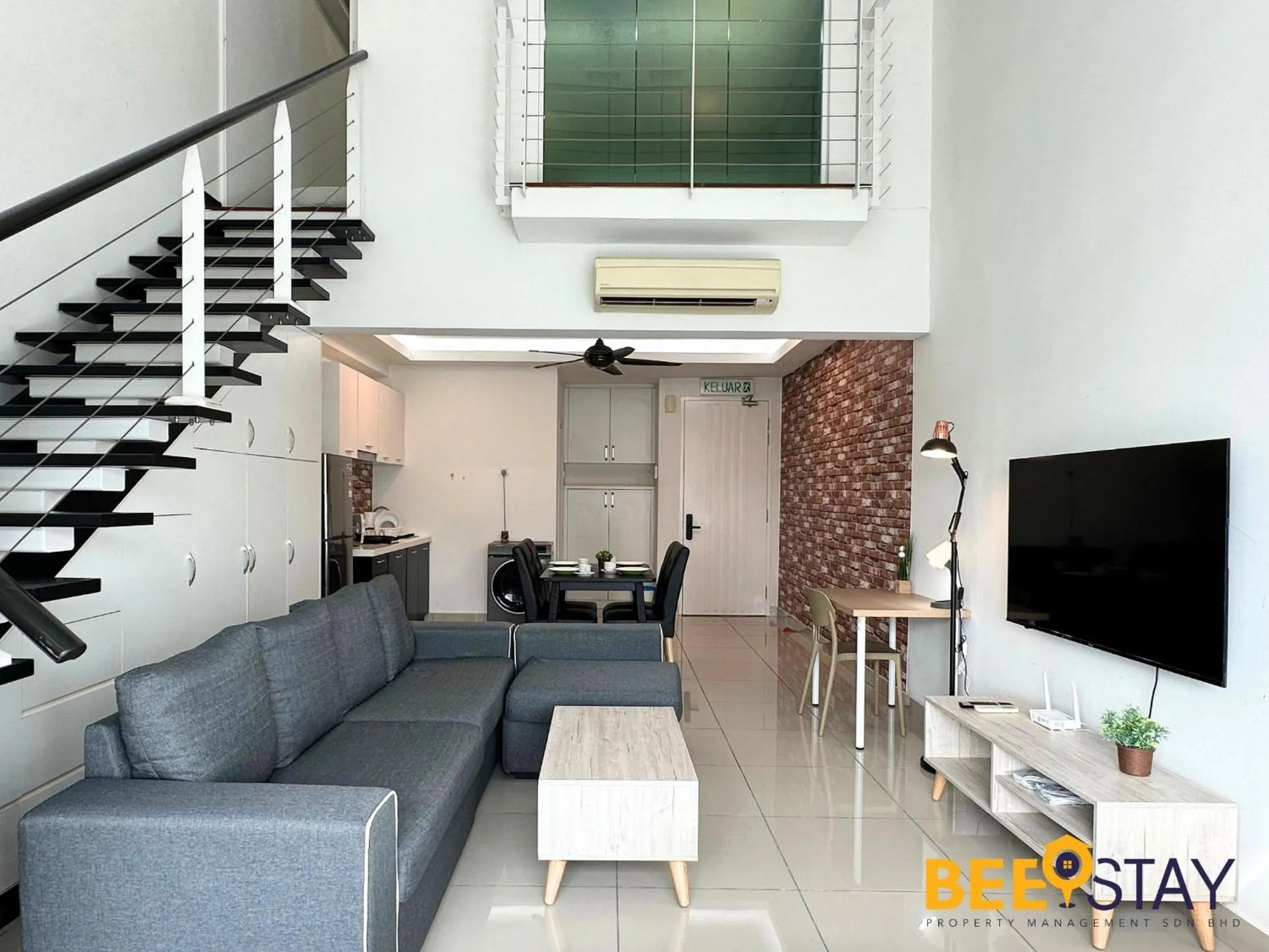 Living room in The Scott Garden Kuala Lumpur by BeeStay Management