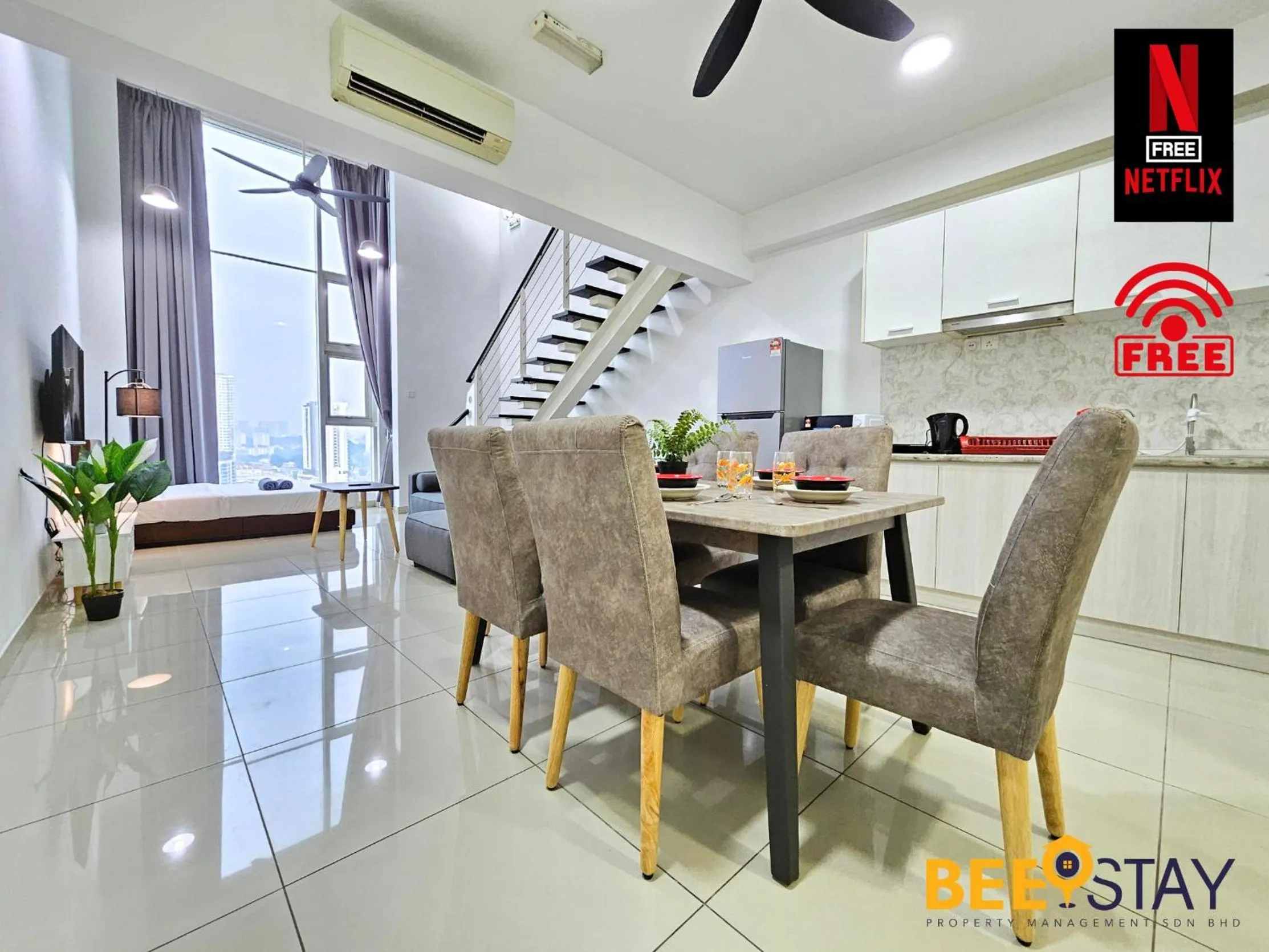 Living room in The Scott Garden Kuala Lumpur by BeeStay Management