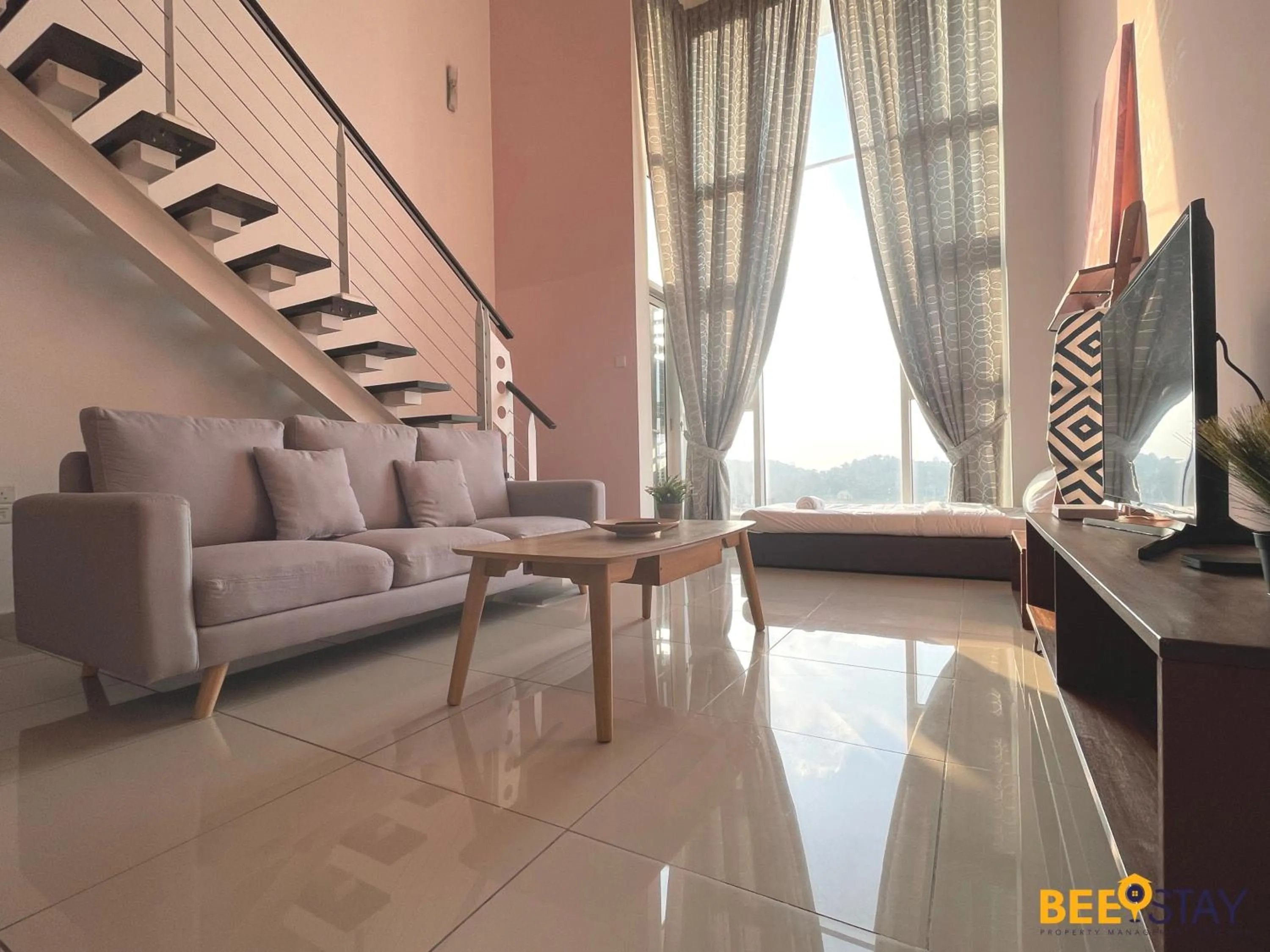 Living room in The Scott Garden Kuala Lumpur by BeeStay Management