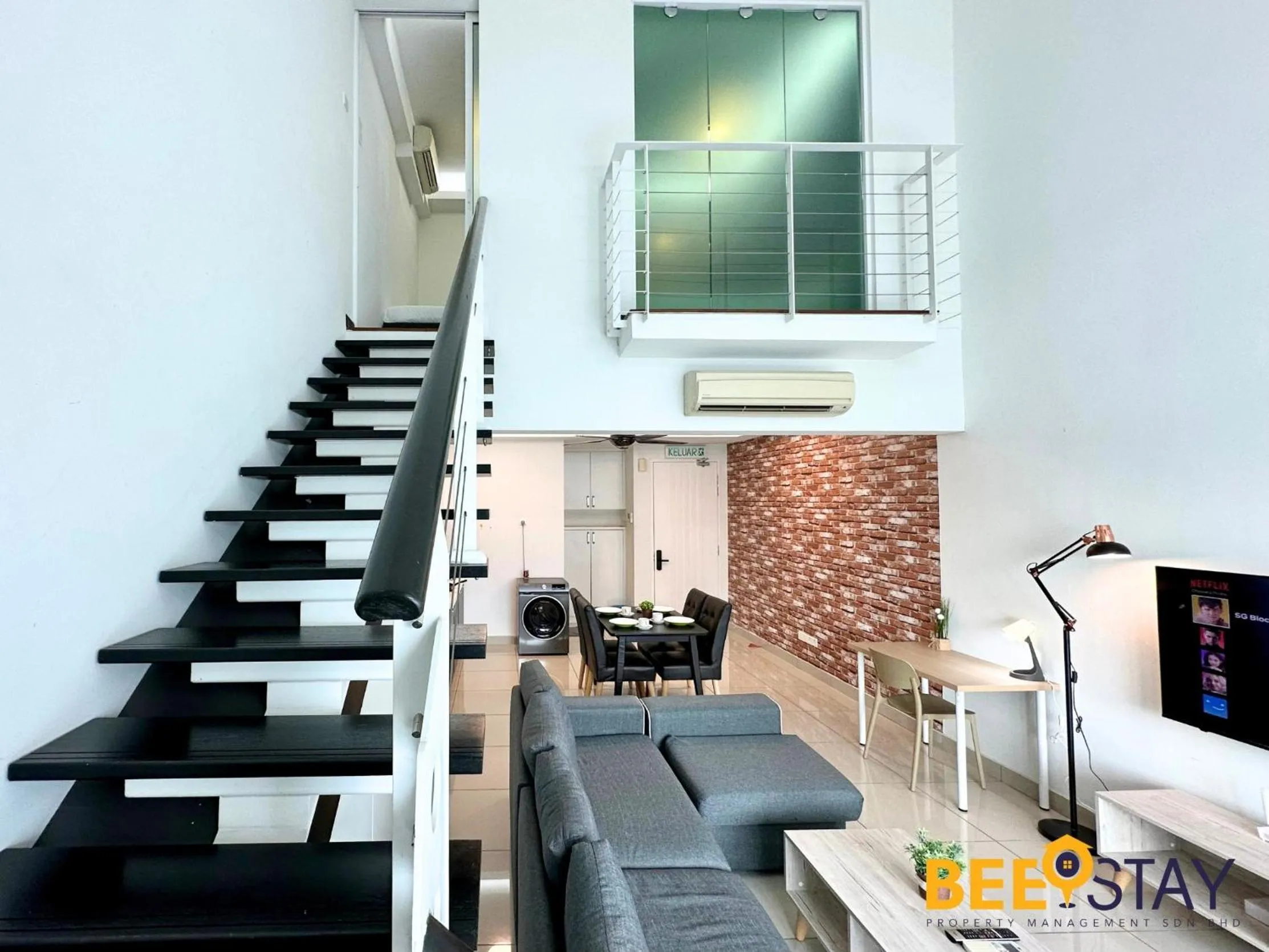 Living room in The Scott Garden Kuala Lumpur by BeeStay Management