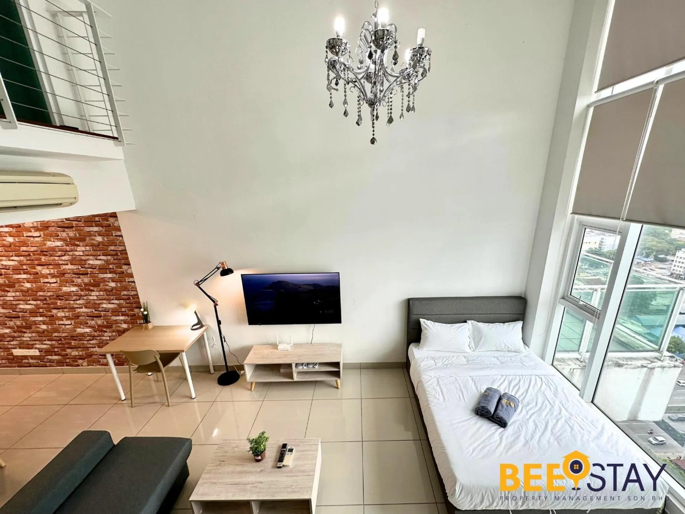 Living room, Bed in The Scott Garden Kuala Lumpur by BeeStay Management