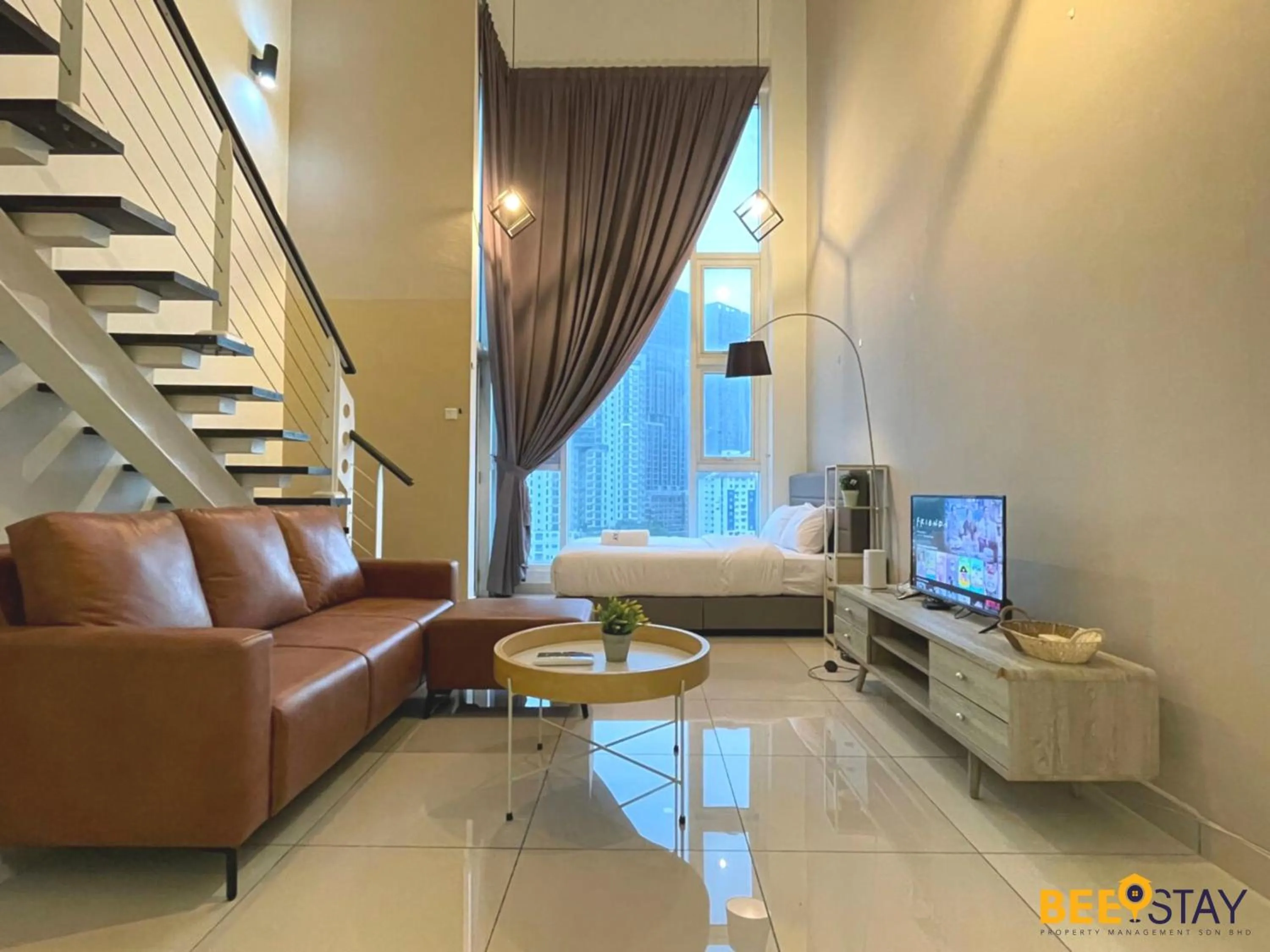 Living room in The Scott Garden Kuala Lumpur by BeeStay Management