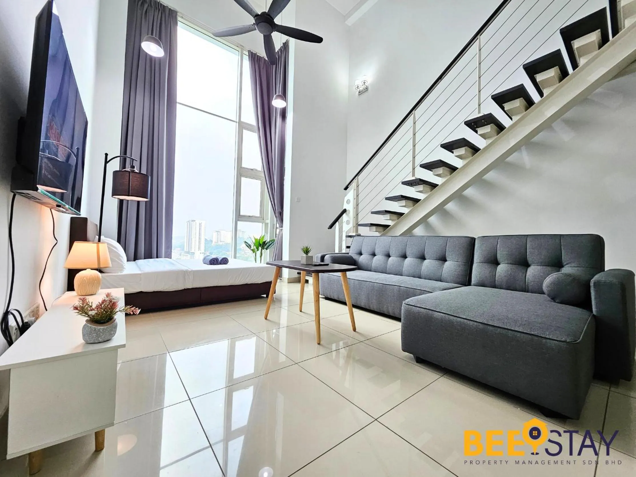 Living room in The Scott Garden Kuala Lumpur by BeeStay Management