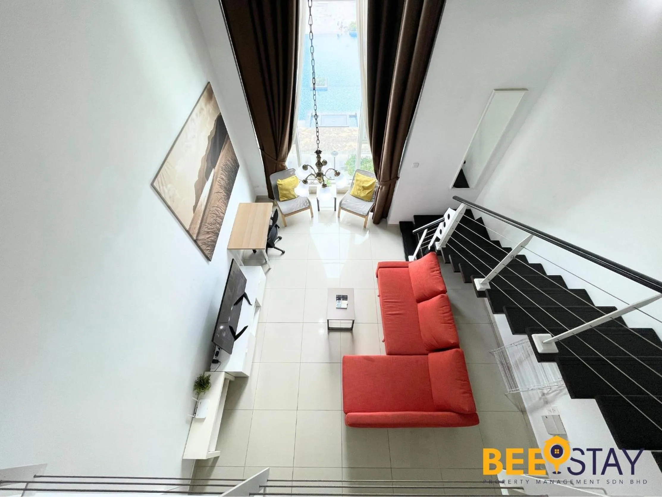 Living room in The Scott Garden Kuala Lumpur by BeeStay Management
