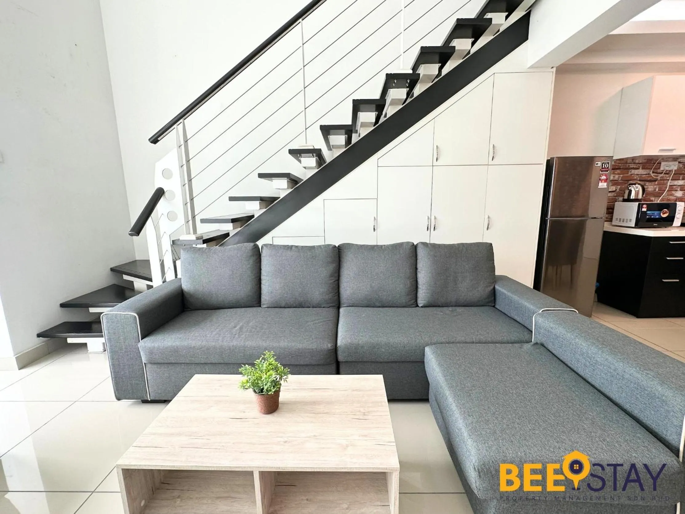 Living room in The Scott Garden Kuala Lumpur by BeeStay Management