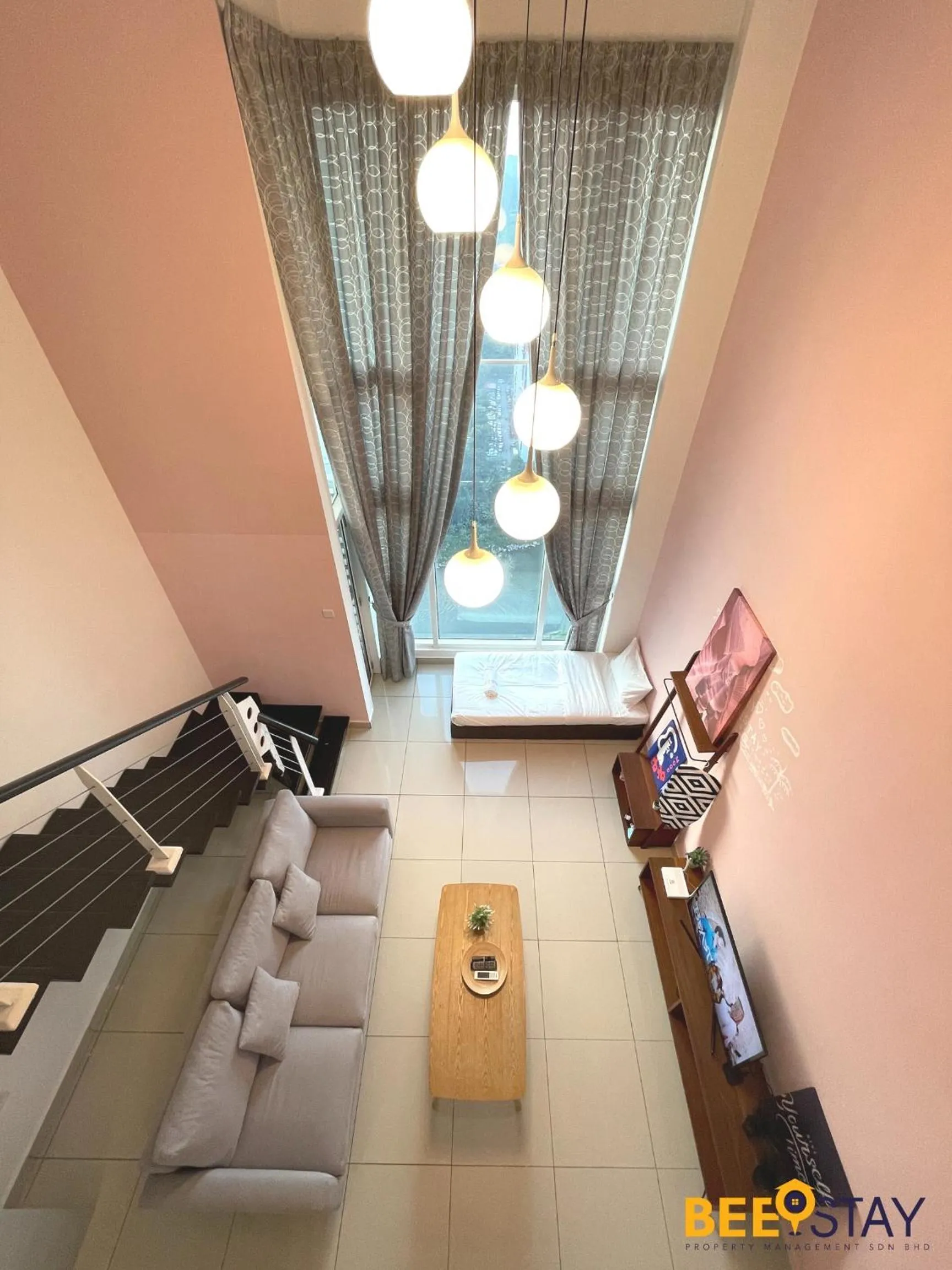 Living room in The Scott Garden Kuala Lumpur by BeeStay Management