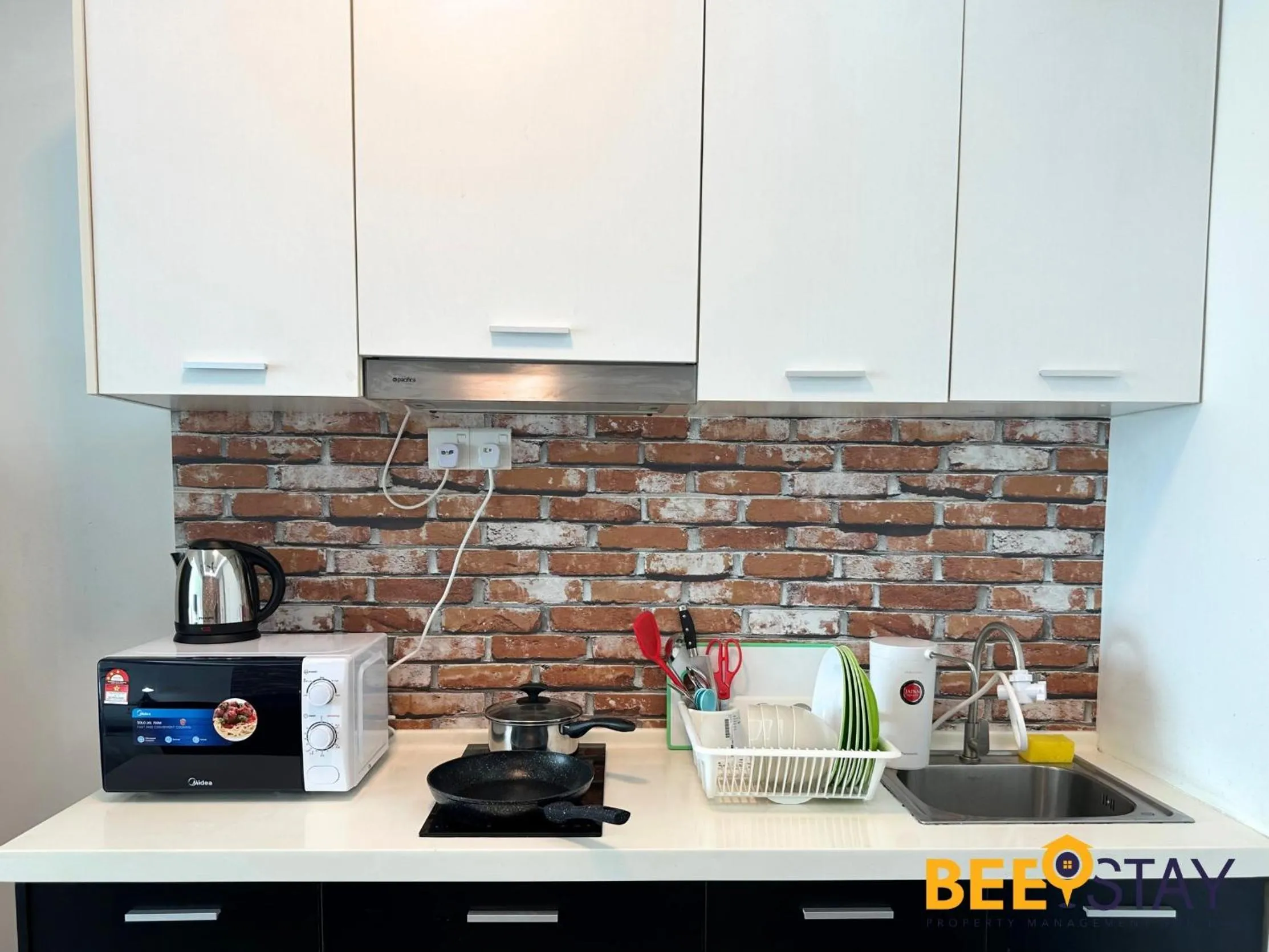 Kitchen or kitchenette in The Scott Garden Kuala Lumpur by BeeStay Management