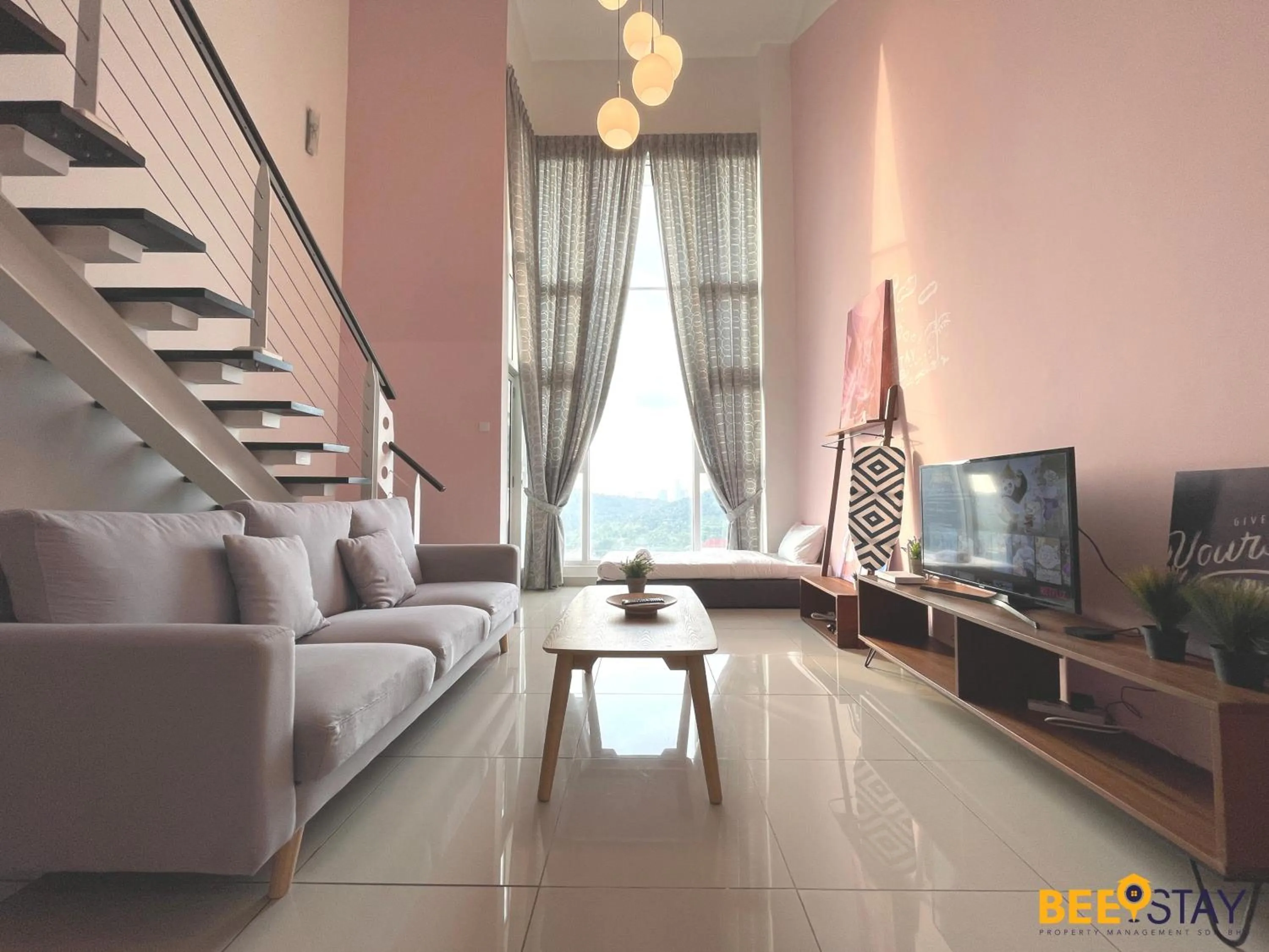 Living room in The Scott Garden Kuala Lumpur by BeeStay Management