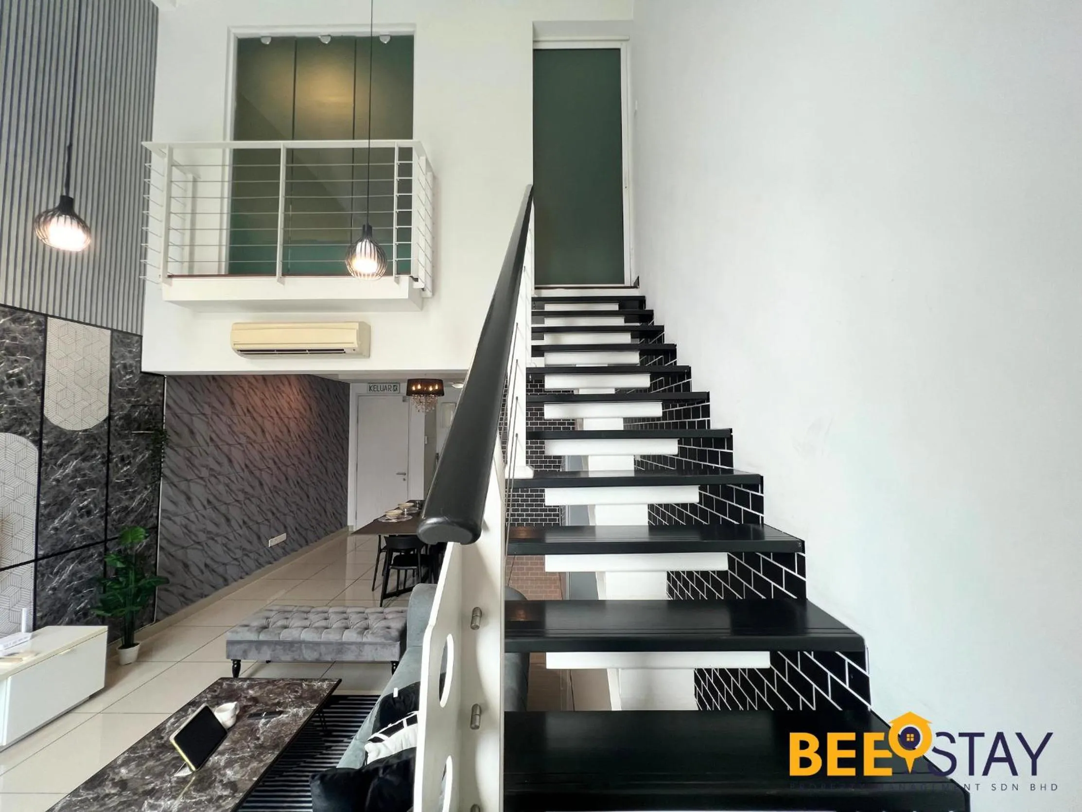 Living room in The Scott Garden Kuala Lumpur by BeeStay Management