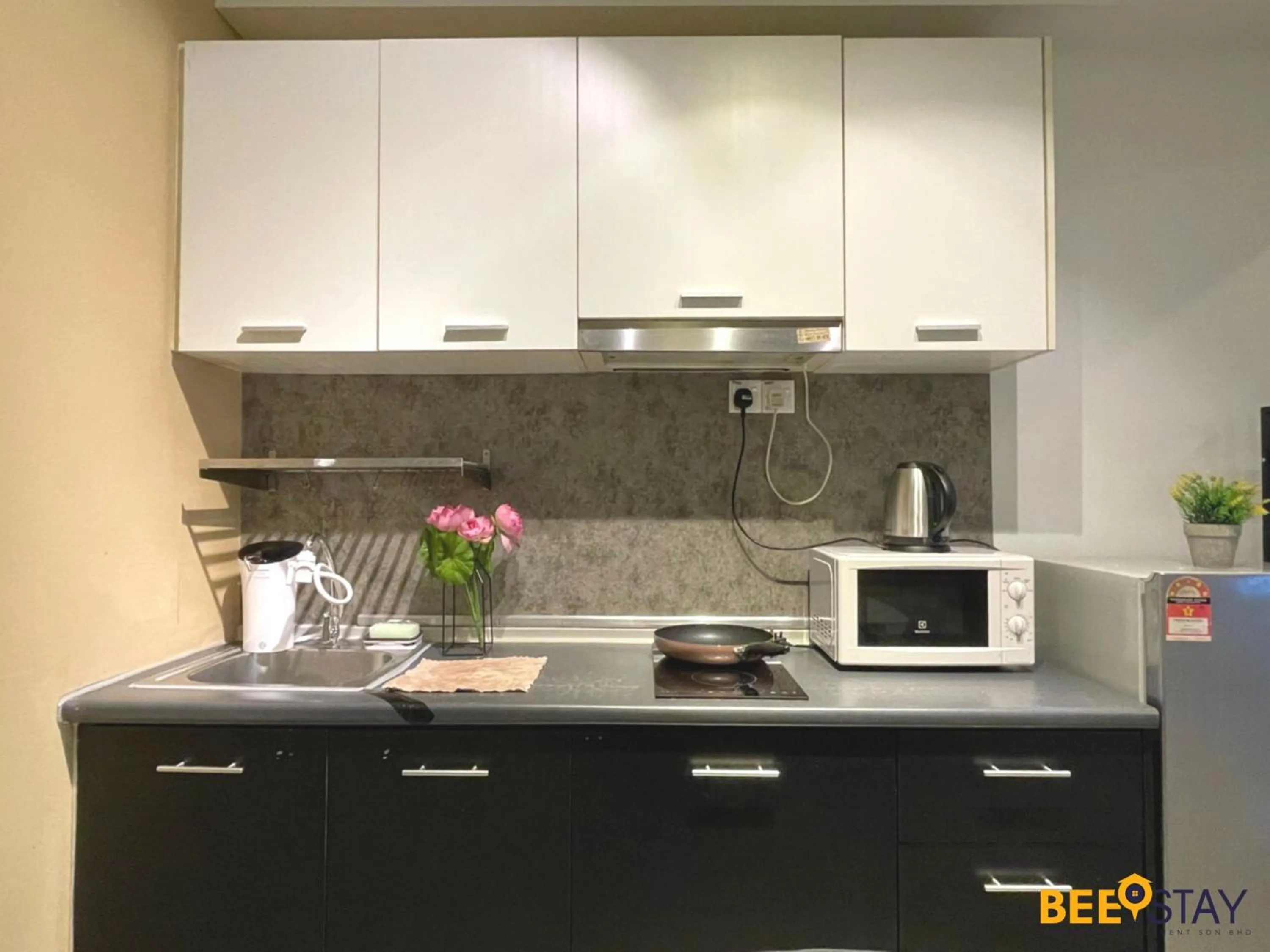 Kitchen or kitchenette in The Scott Garden Kuala Lumpur by BeeStay Management