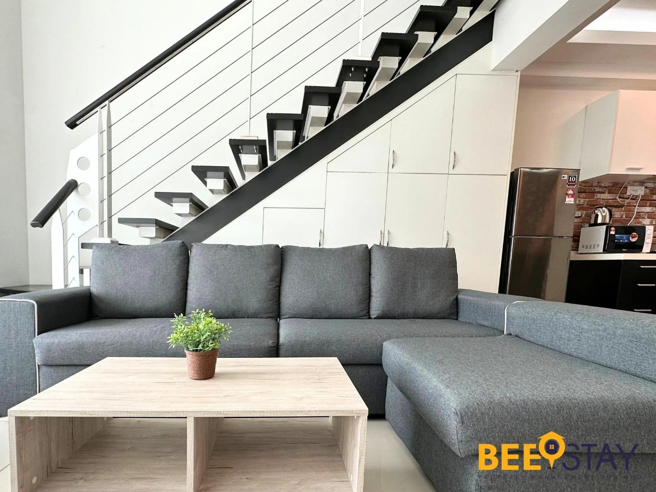 Living room in The Scott Garden Kuala Lumpur by BeeStay Management