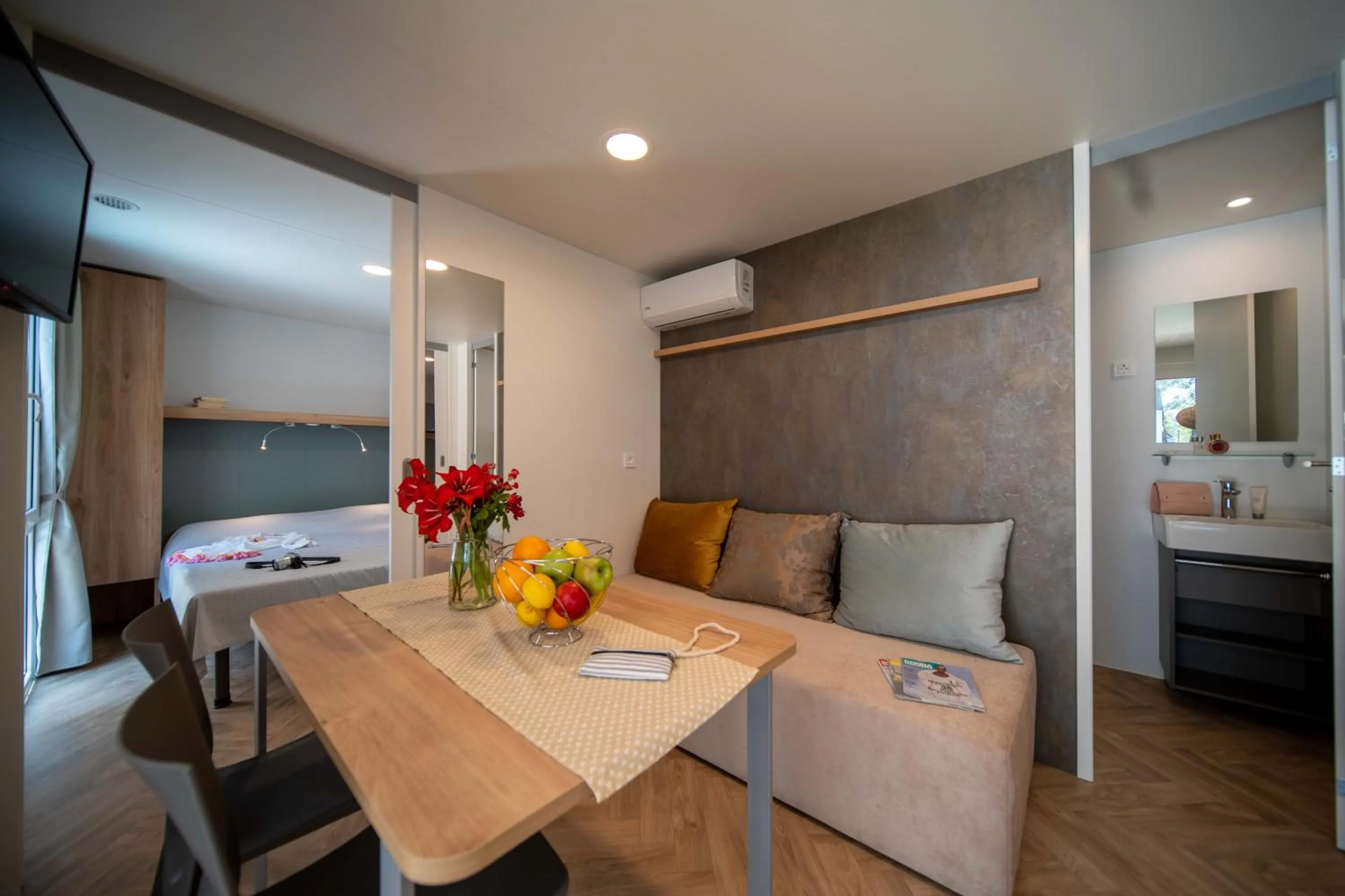 Dining area, Bed in Holiday Centre Bi village