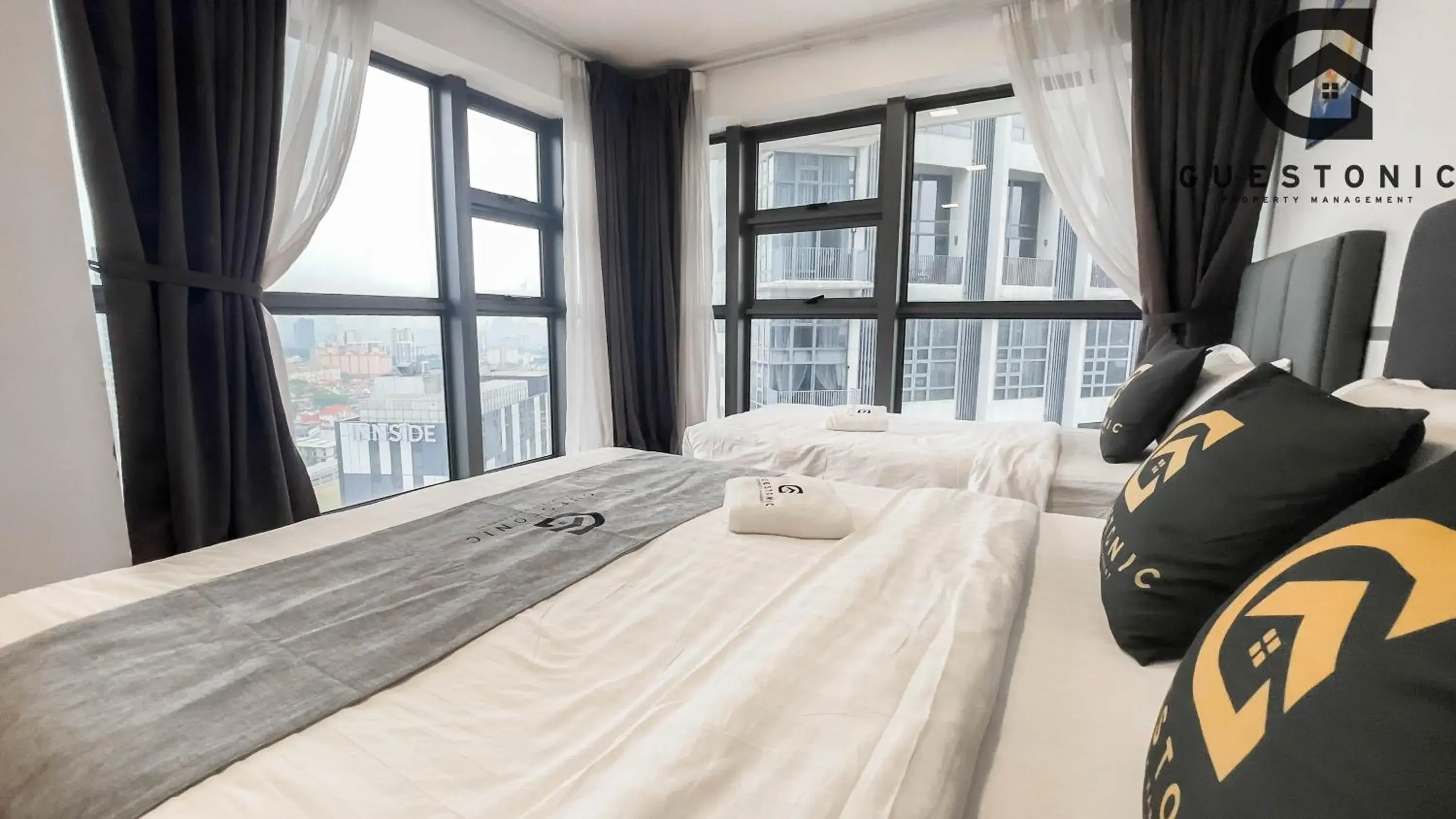 Bed in EkoCheras Cozy Suite by GUESTONIC Bed in EkoCheras Cozy Suite by GUESTONIC