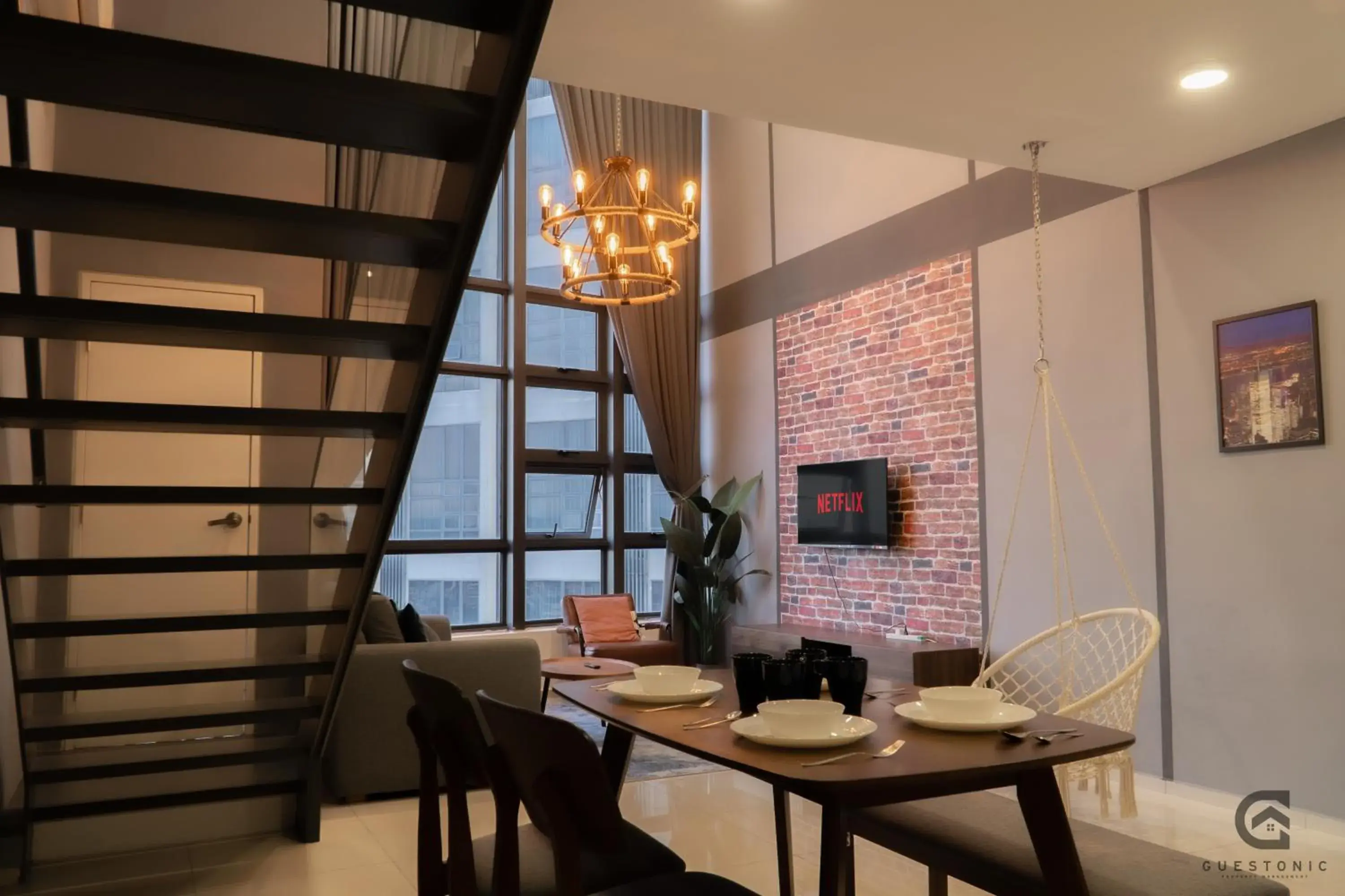 Living room in EkoCheras Cozy Suite by GUESTONIC Living room in EkoCheras Cozy Suite by GUESTONIC