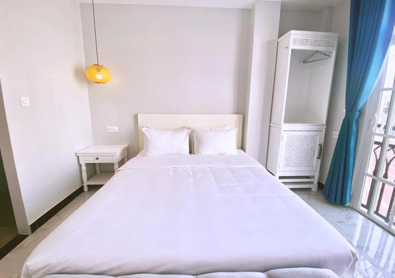 Bed in Moonlight Hotel Phu Quoc