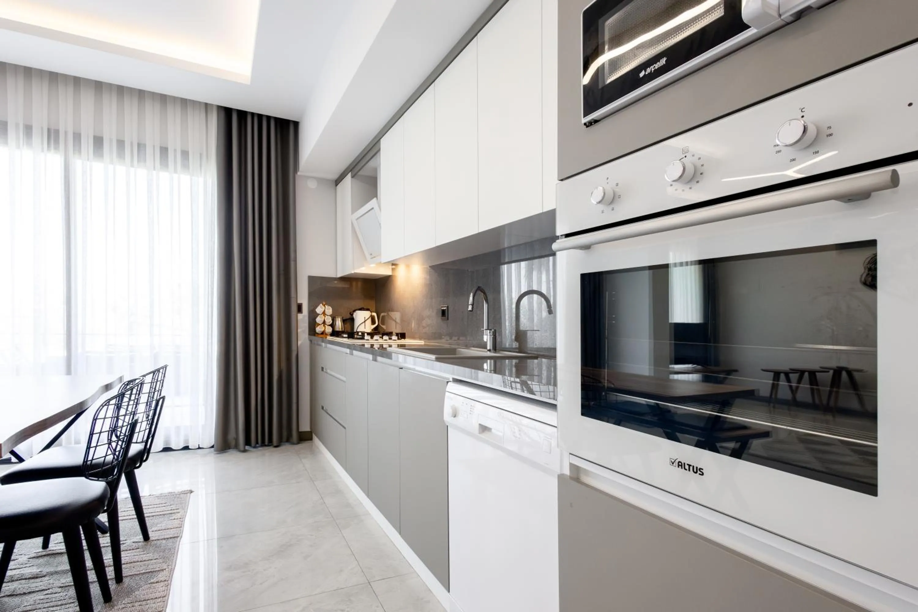 Kitchen or kitchenette in Artan Suites Tatil Evleri