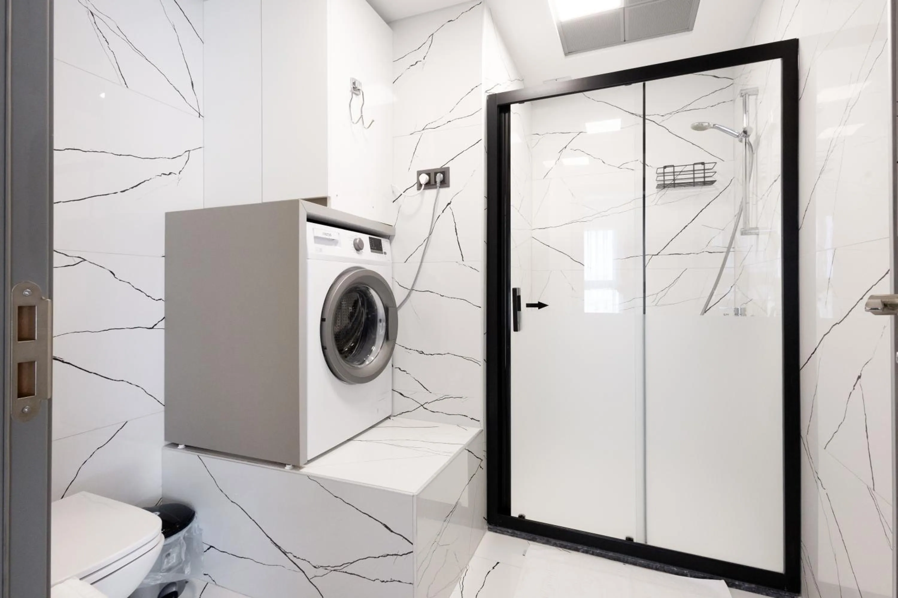 washing machine in Artan Suites Tatil Evleri