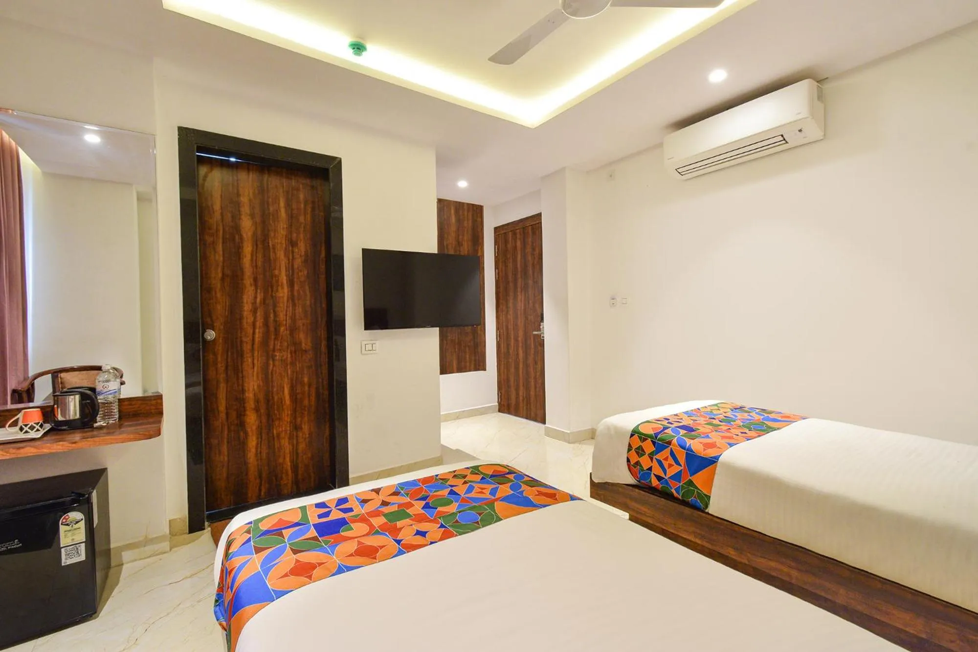 Bed in FabHotel Prime Prowell Apex