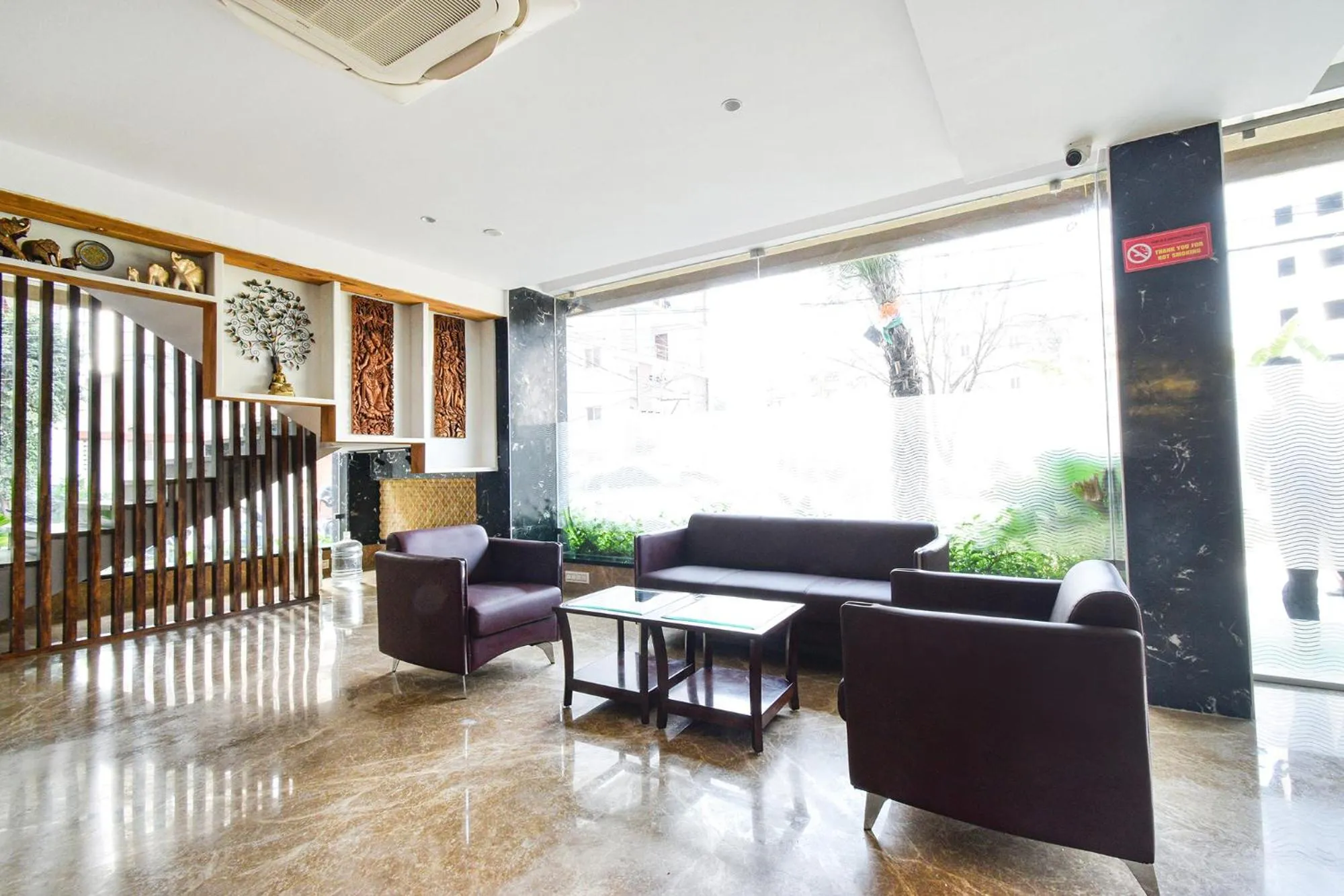 Seating area in FabHotel Prime Prowell Apex