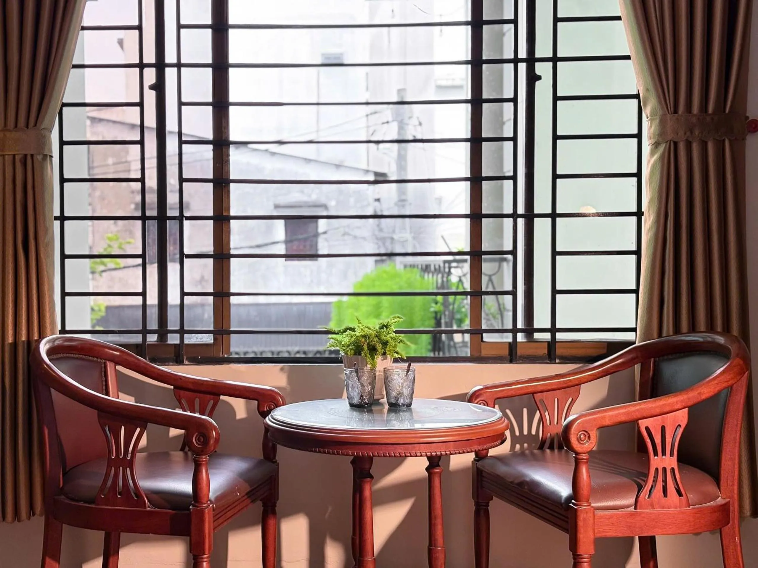 Seating area in BÊ TÔNG RESIDENCES HOMESTAY