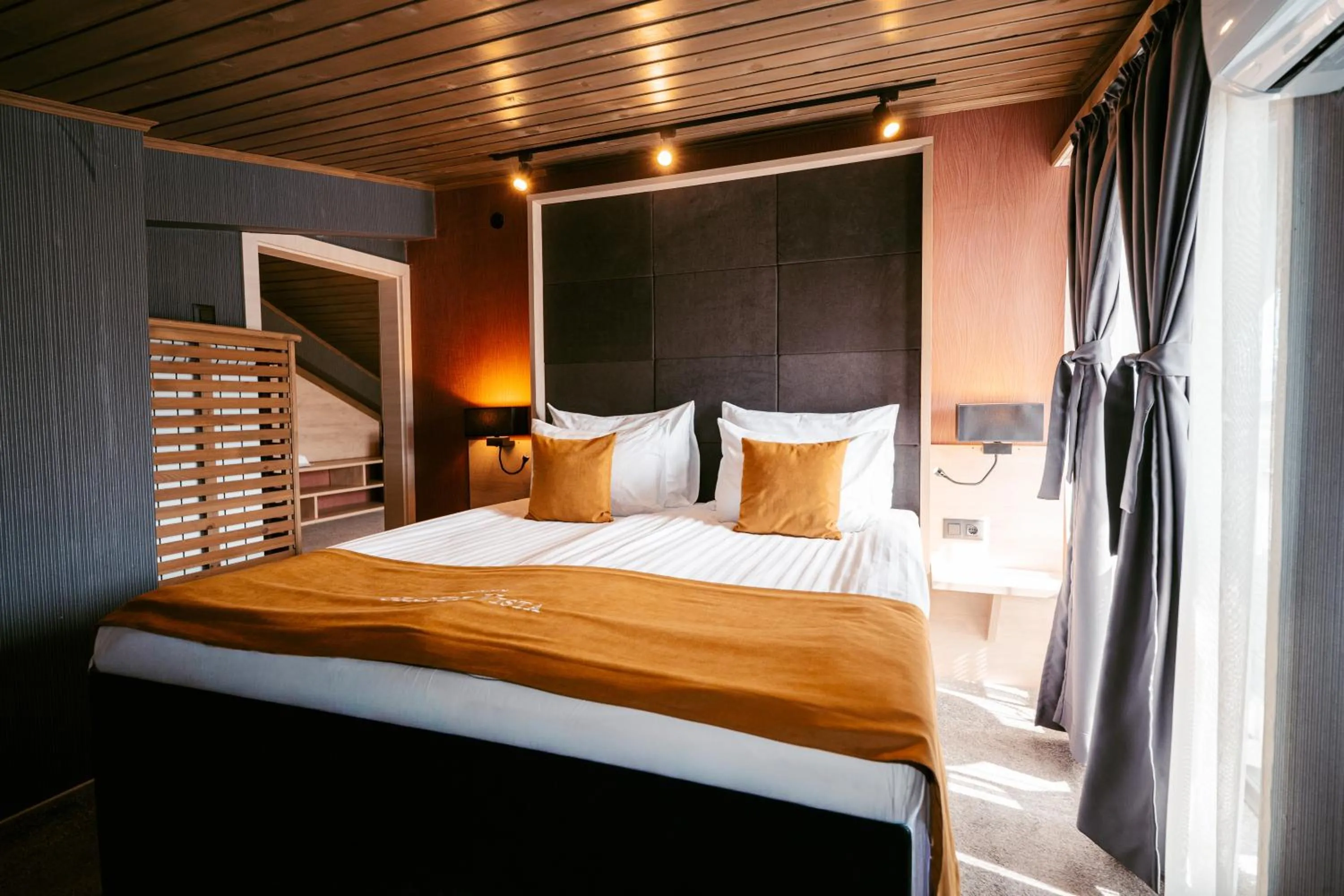 Bed in Grande Vista Resort & Spa