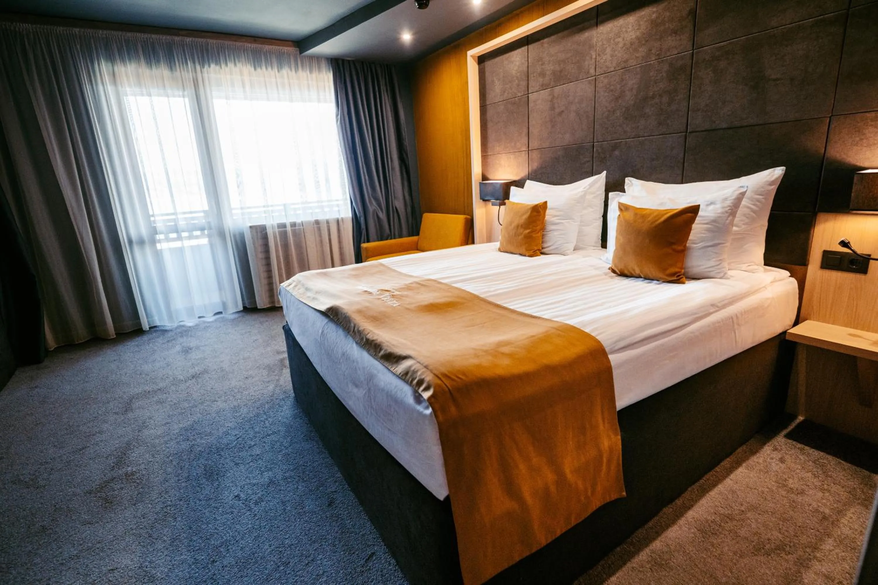 Bed in Grande Vista Resort & Spa
