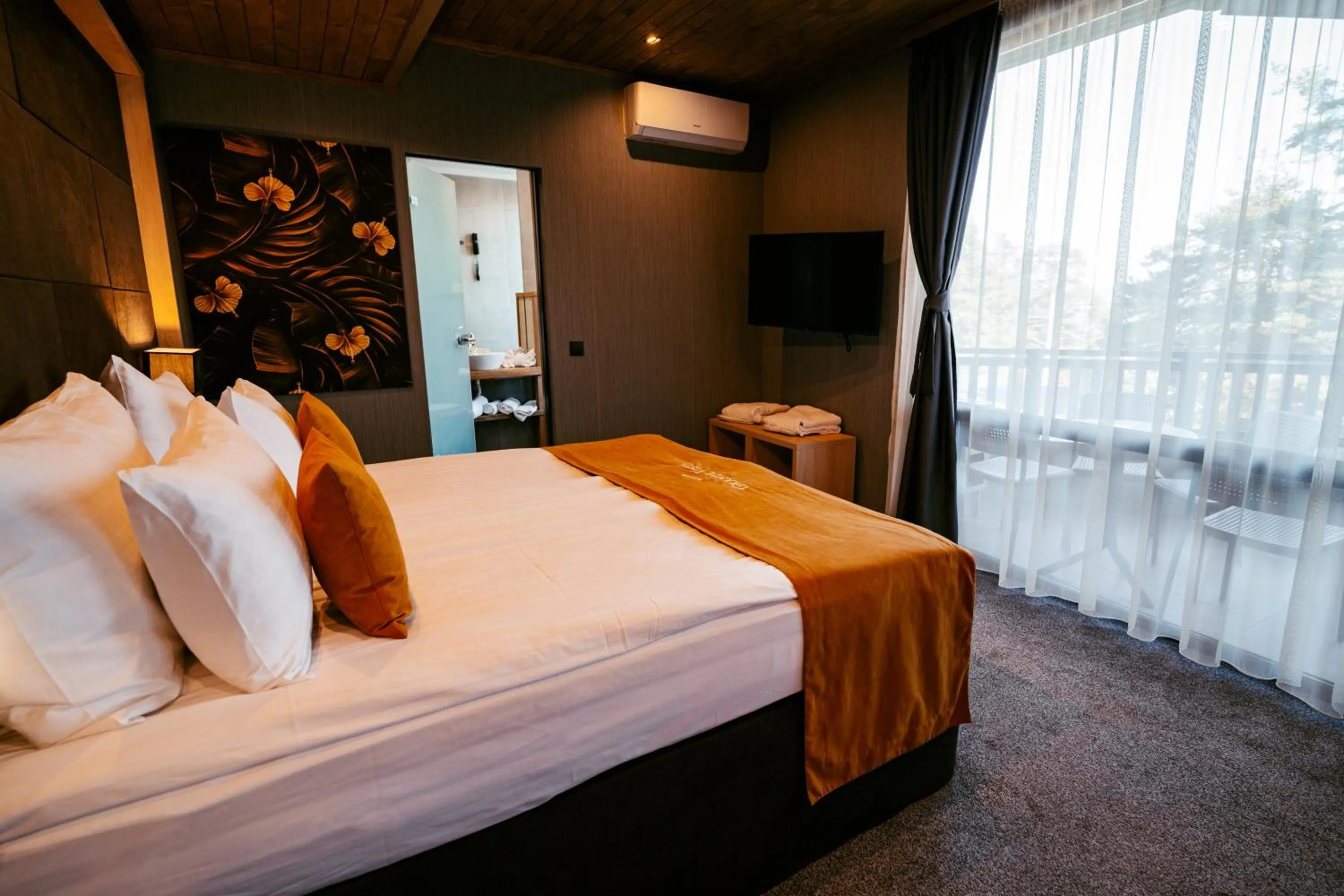 Bed in Grande Vista Resort & Spa