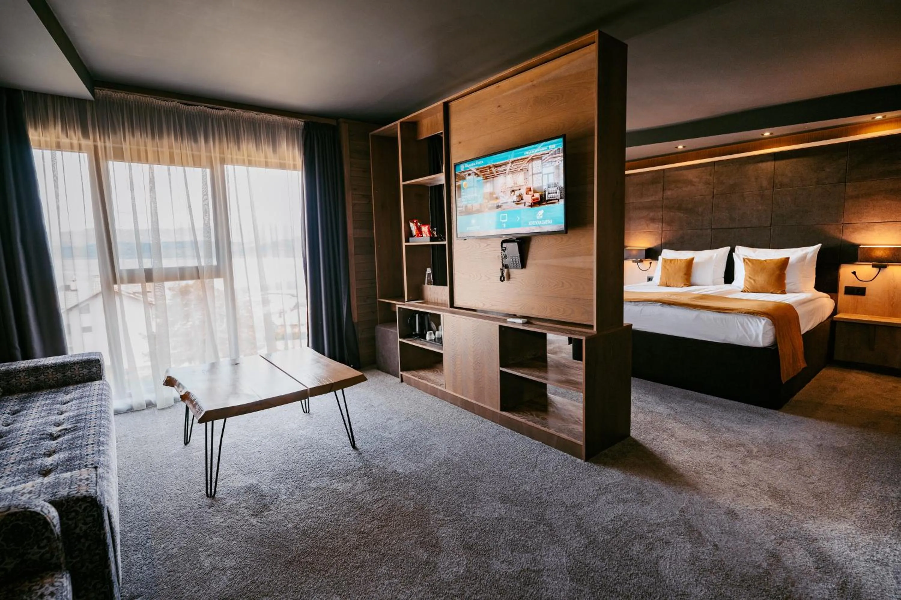 Communal lounge/ TV room, Bed in Grande Vista Resort & Spa
