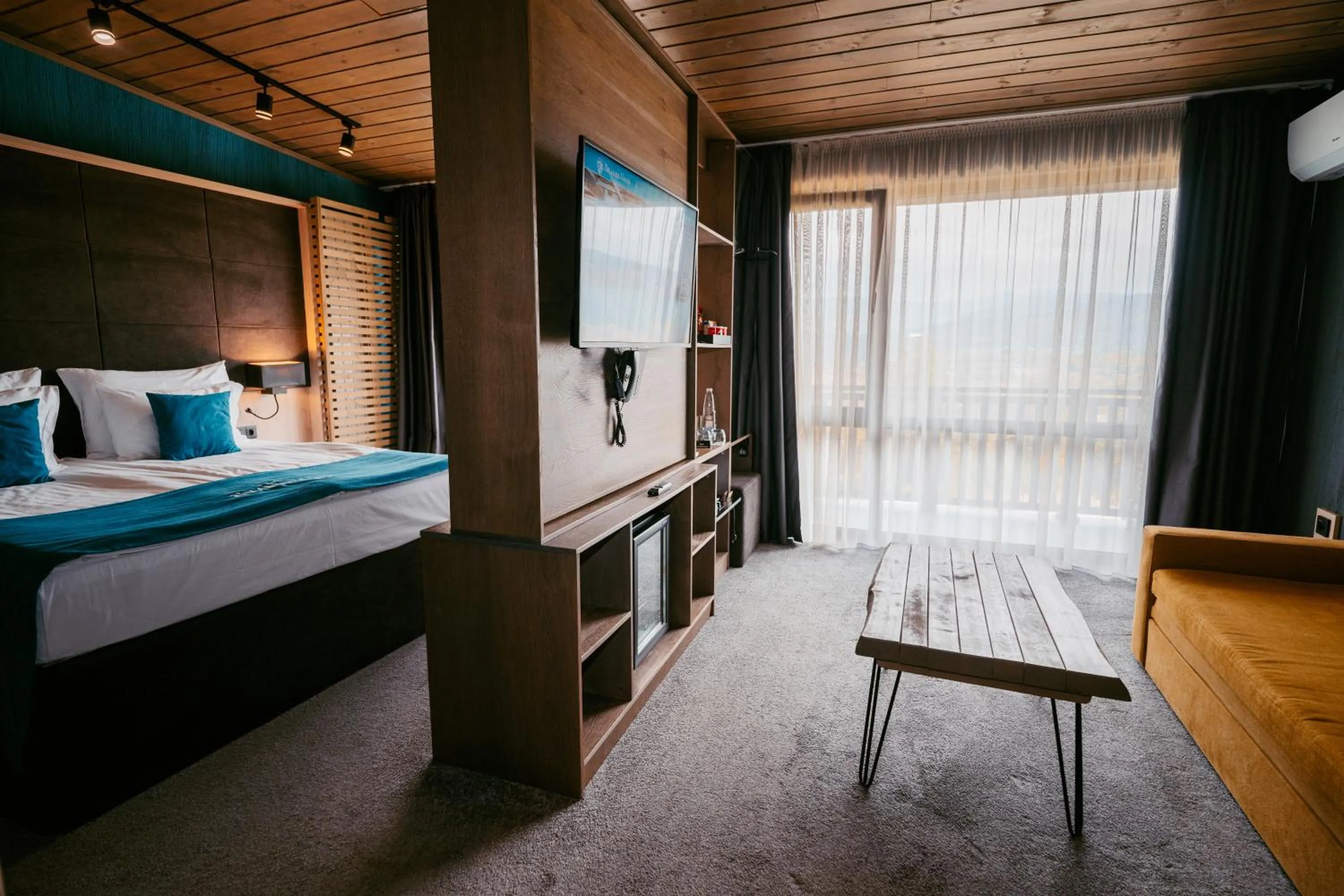 Communal lounge/ TV room, Bed in Grande Vista Resort & Spa