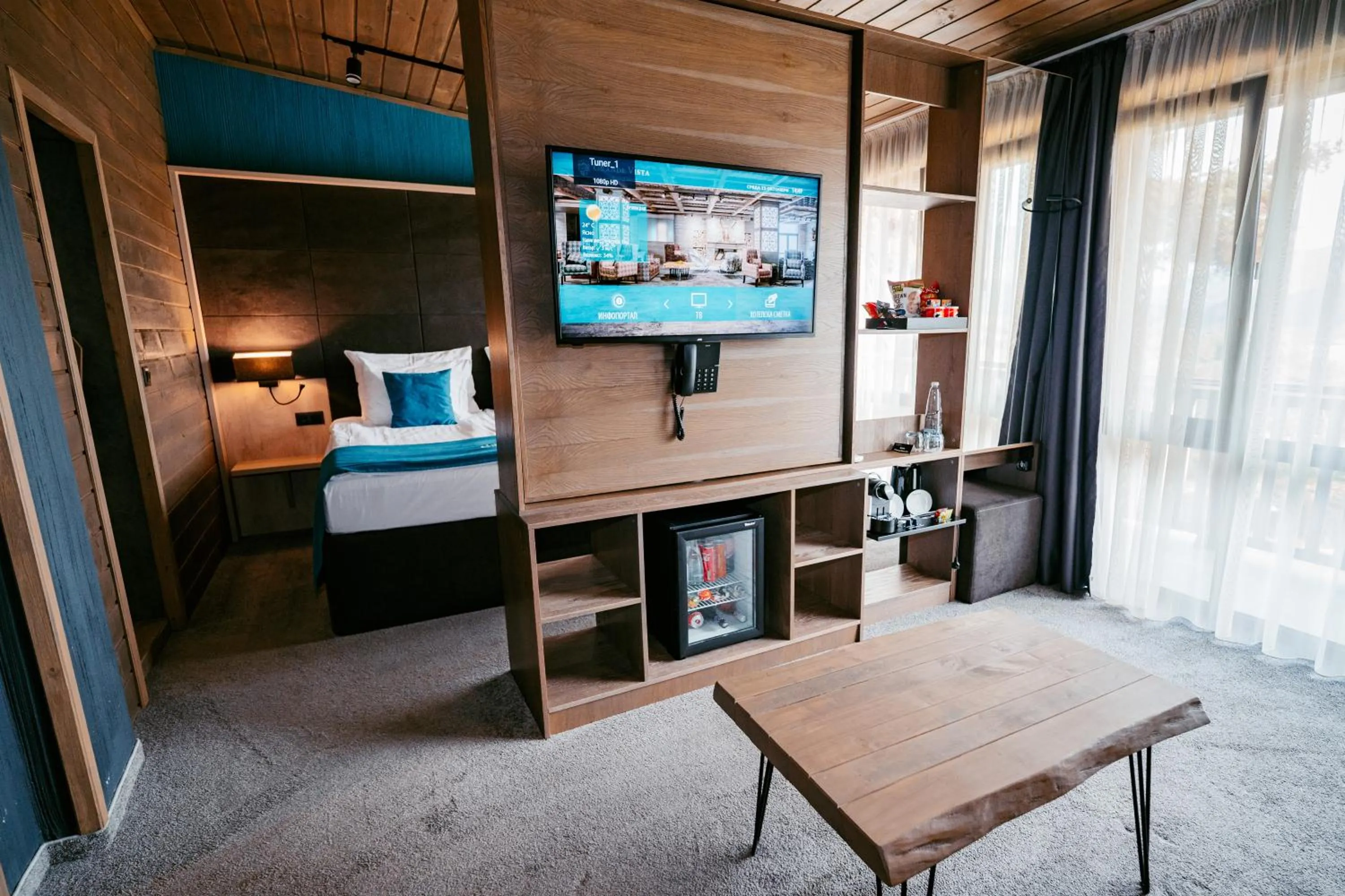 Communal lounge/ TV room, Bed in Grande Vista Resort & Spa