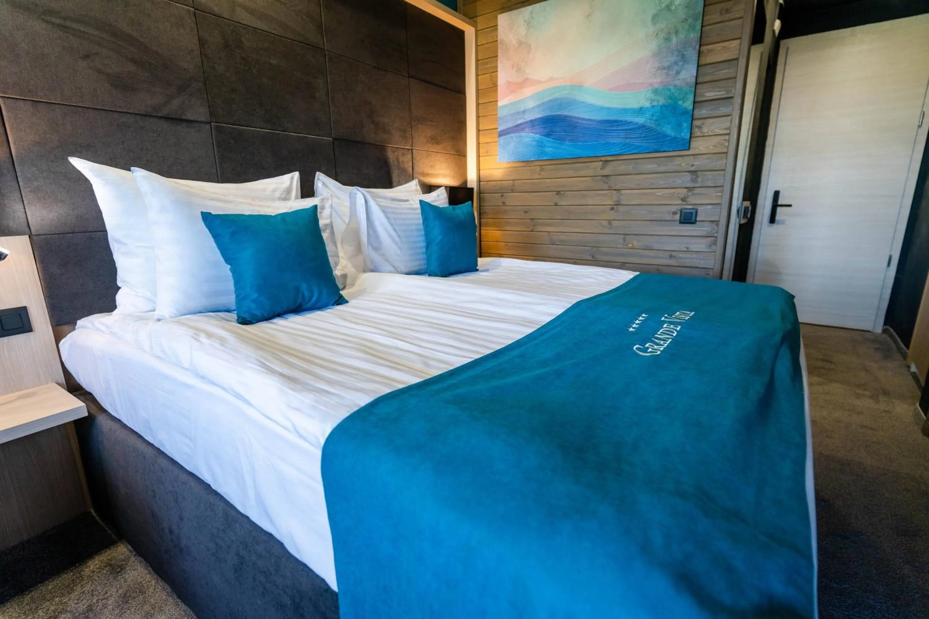 Bed in Grande Vista Resort & Spa