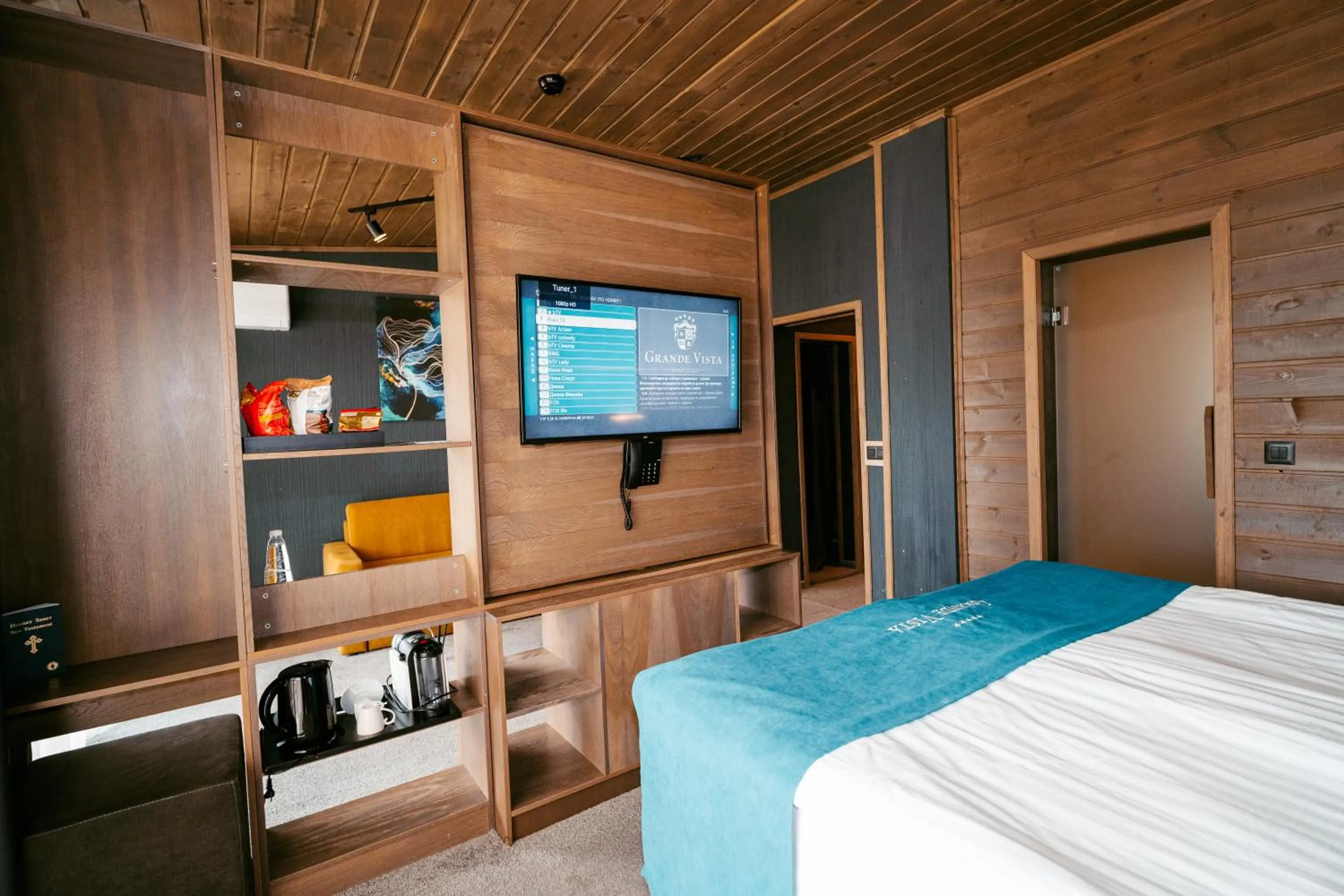 Communal lounge/ TV room, Bed in Grande Vista Resort & Spa