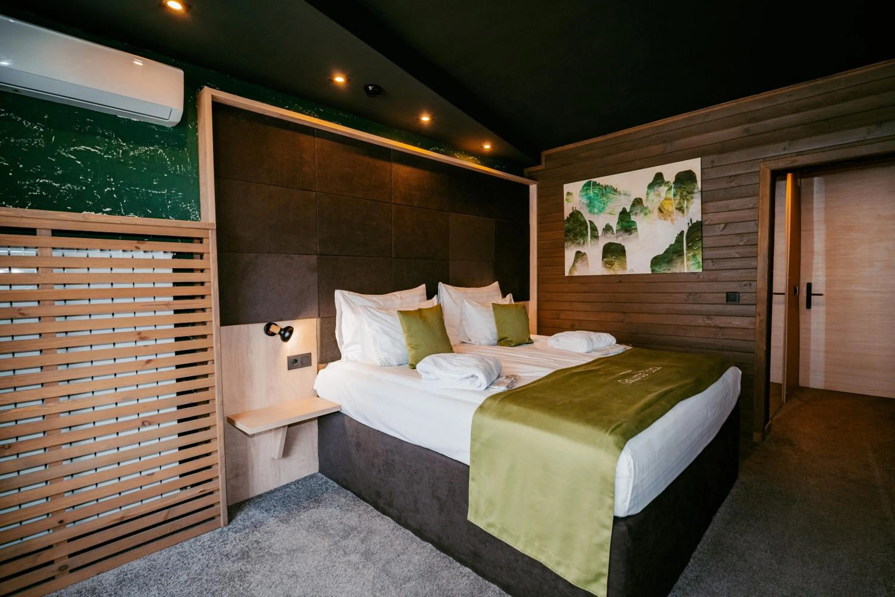 Bed in Grande Vista Resort & Spa