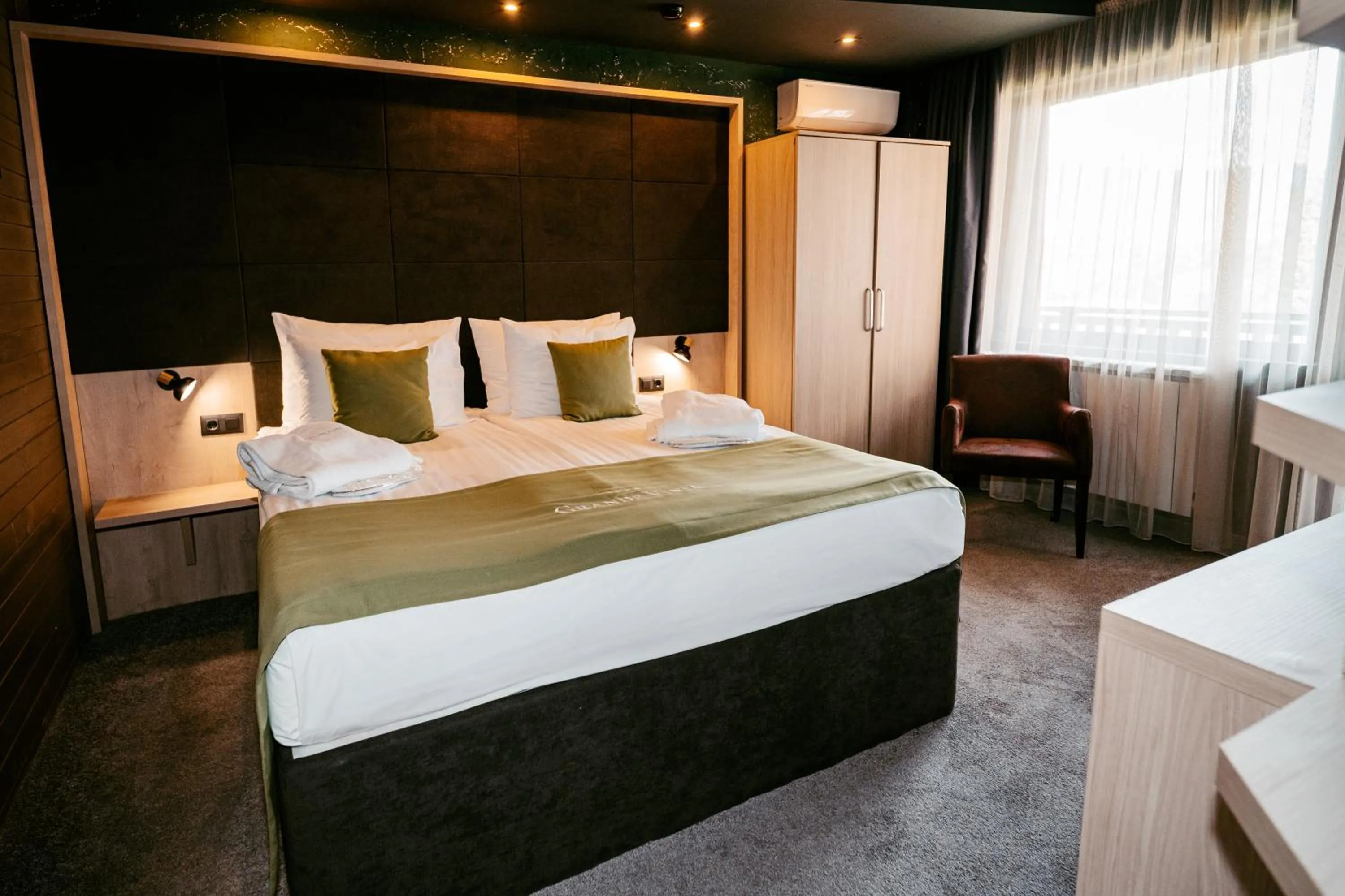 Bed in Grande Vista Resort & Spa