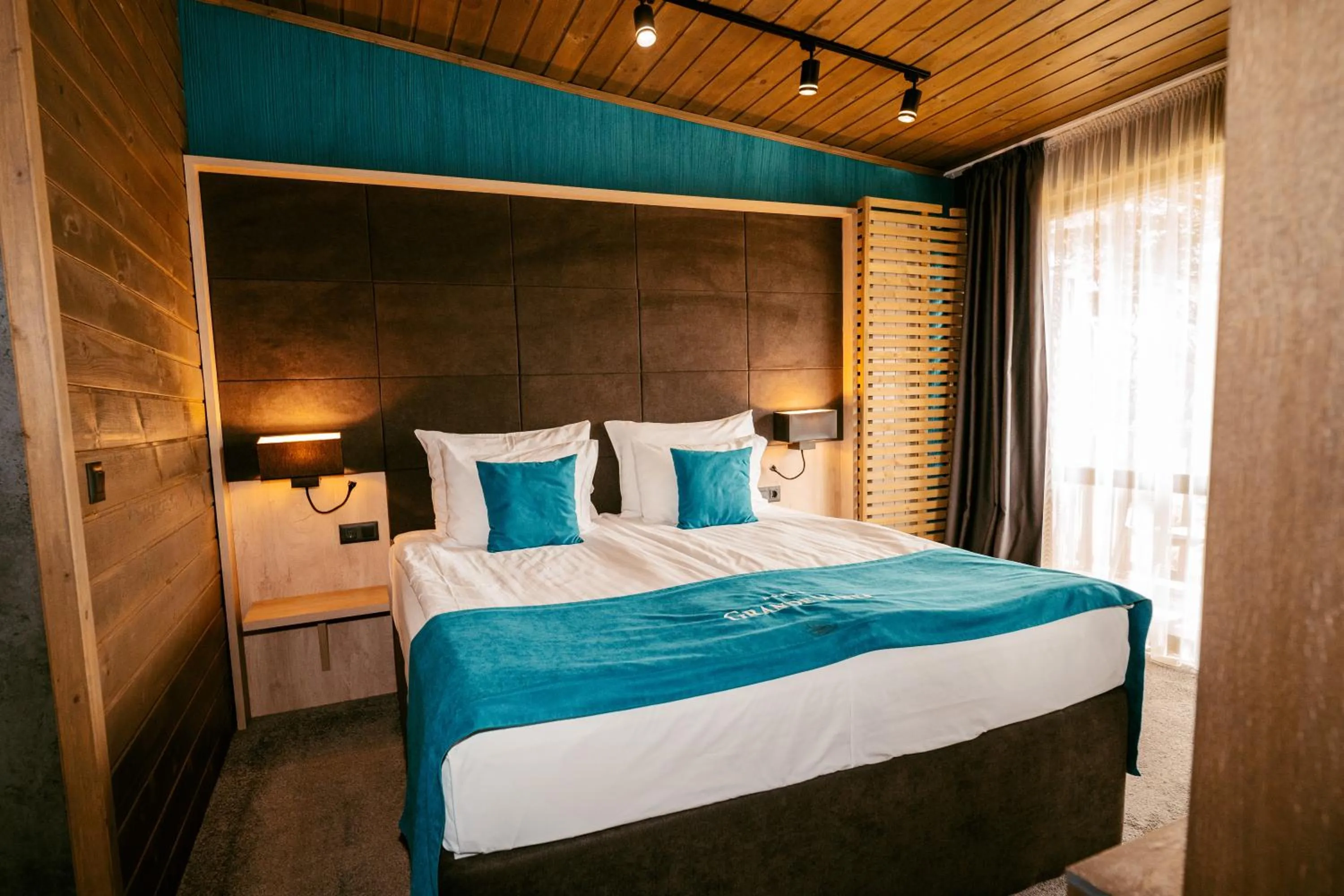 Bed in Grande Vista Resort & Spa