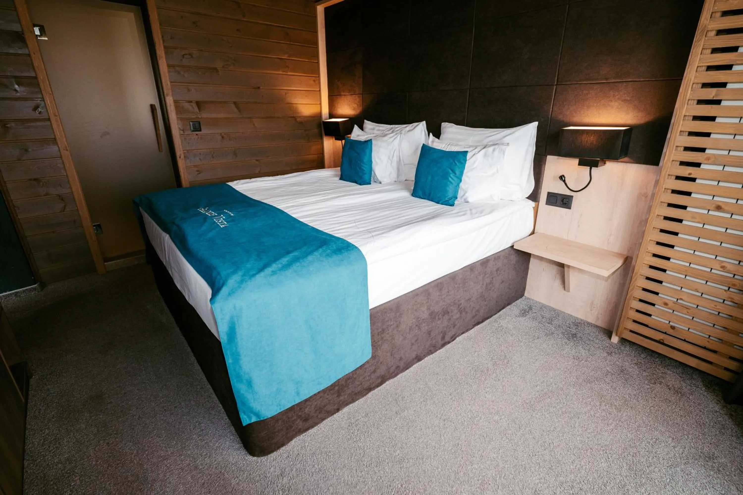 Bed in Grande Vista Resort & Spa