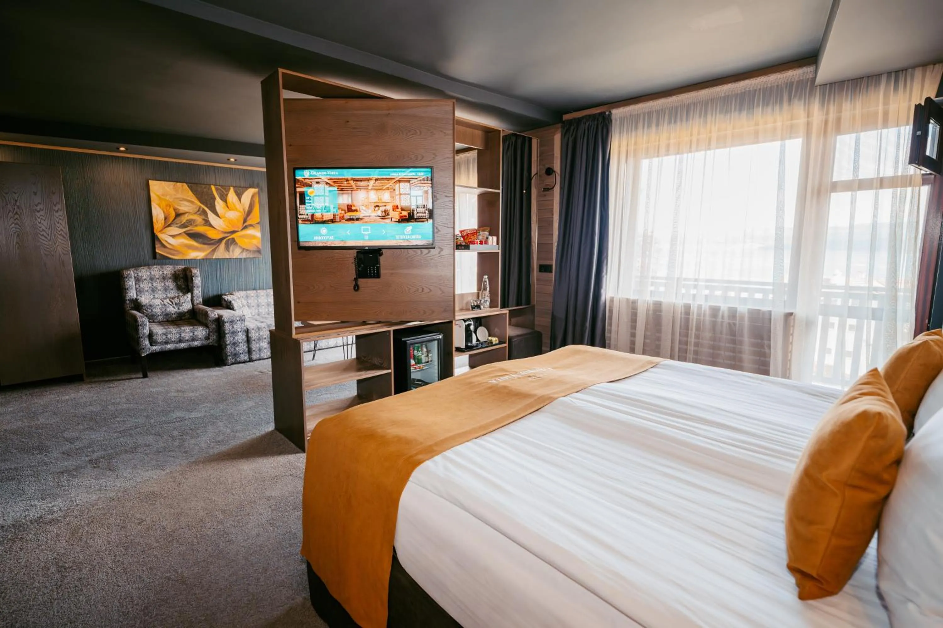 Communal lounge/ TV room, Bed in Grande Vista Resort & Spa