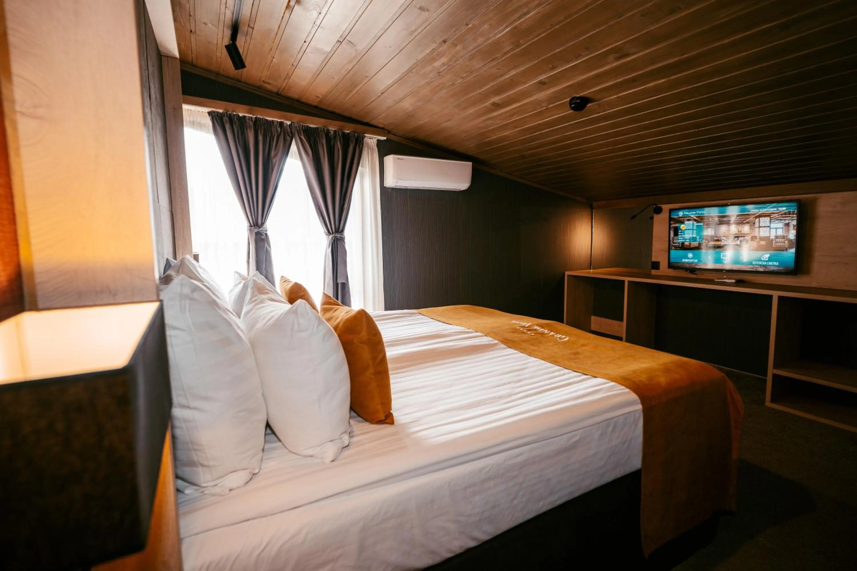 Bed in Grande Vista Resort & Spa