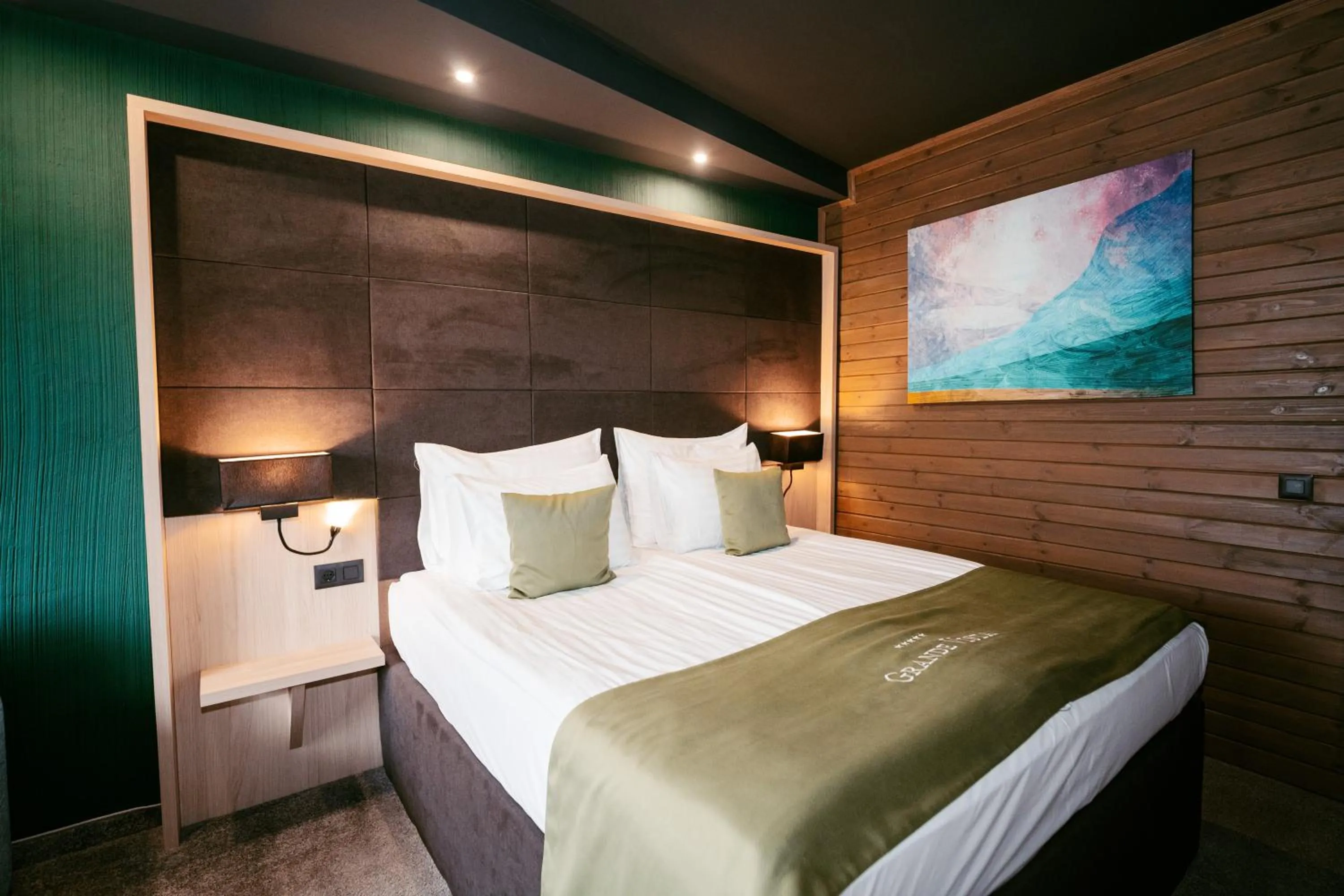 Bed in Grande Vista Resort & Spa