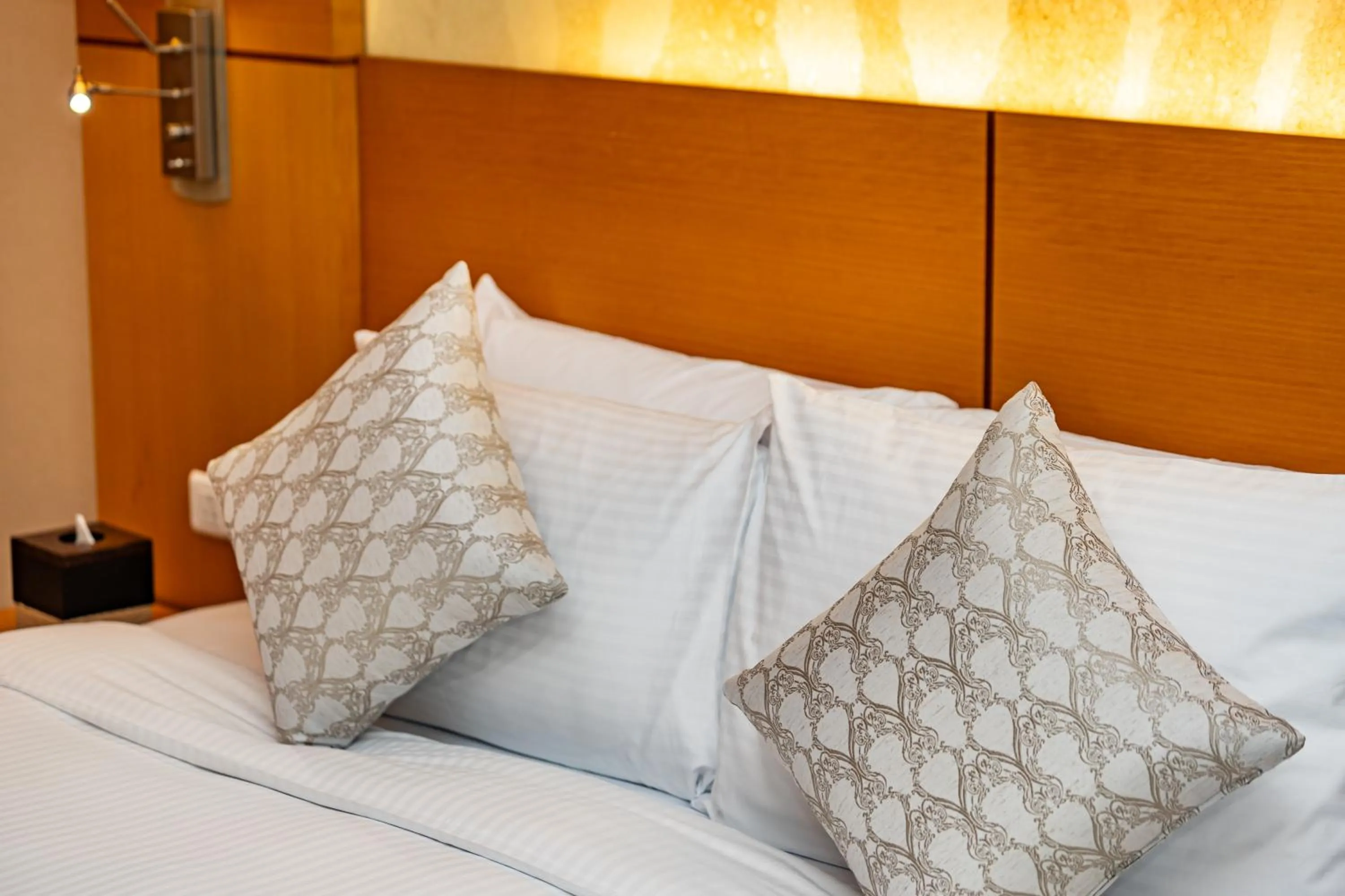 Bed in Carlton Downtown Hotel