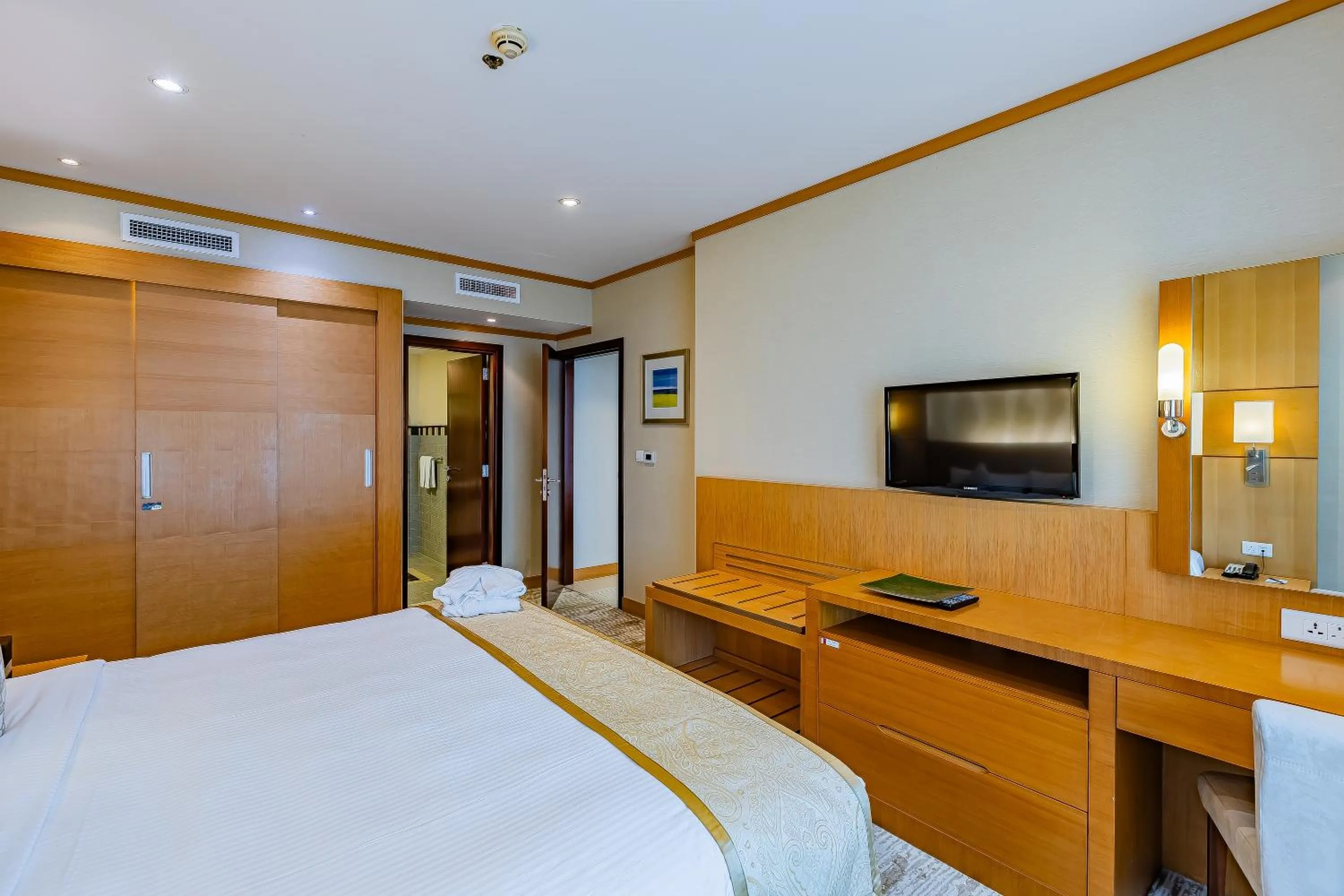 Bed in Carlton Downtown Hotel