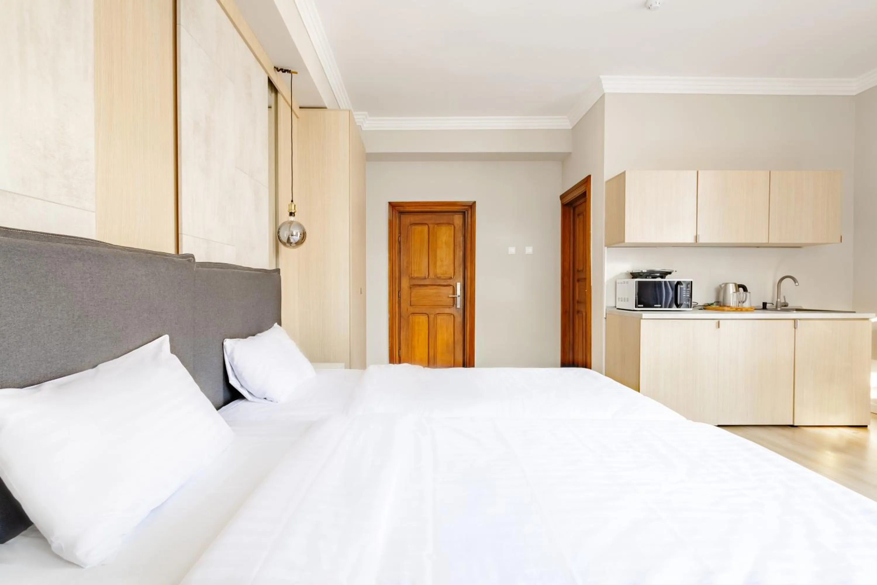 Bed in Piccolo Mondo by CityBookings