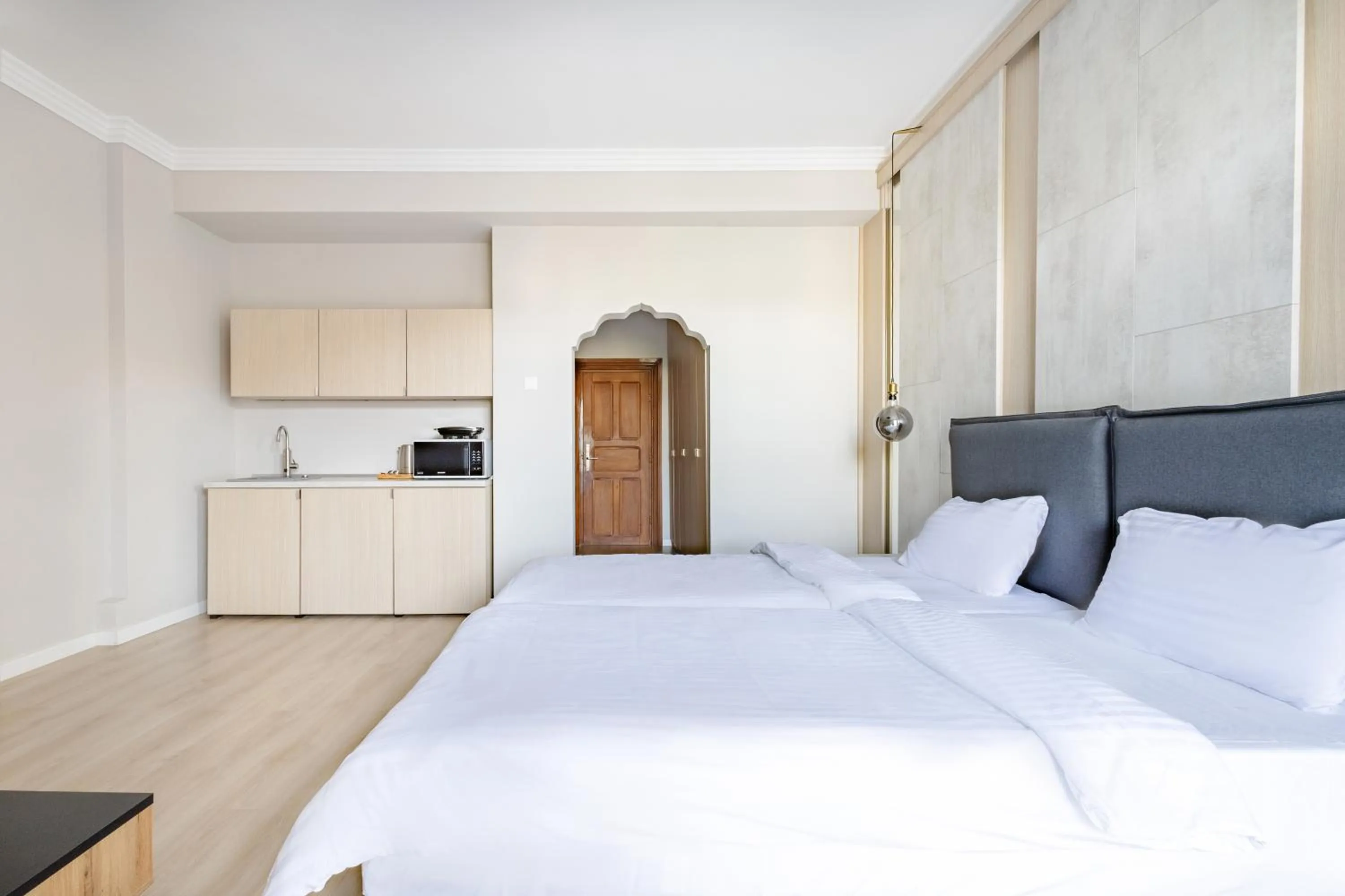 Bed in Piccolo Mondo by CityBookings