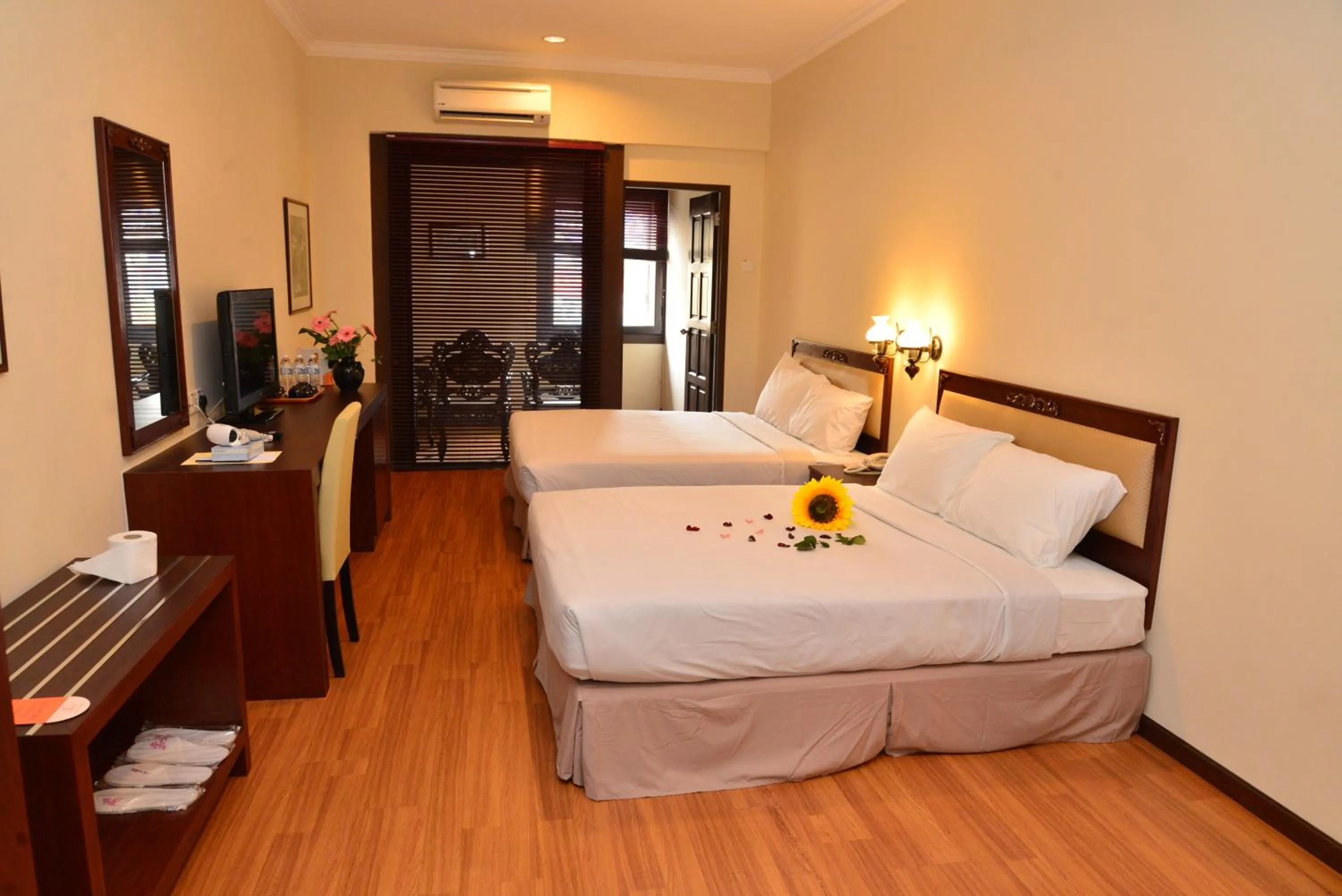 Bed in Cheng Ho Hotel