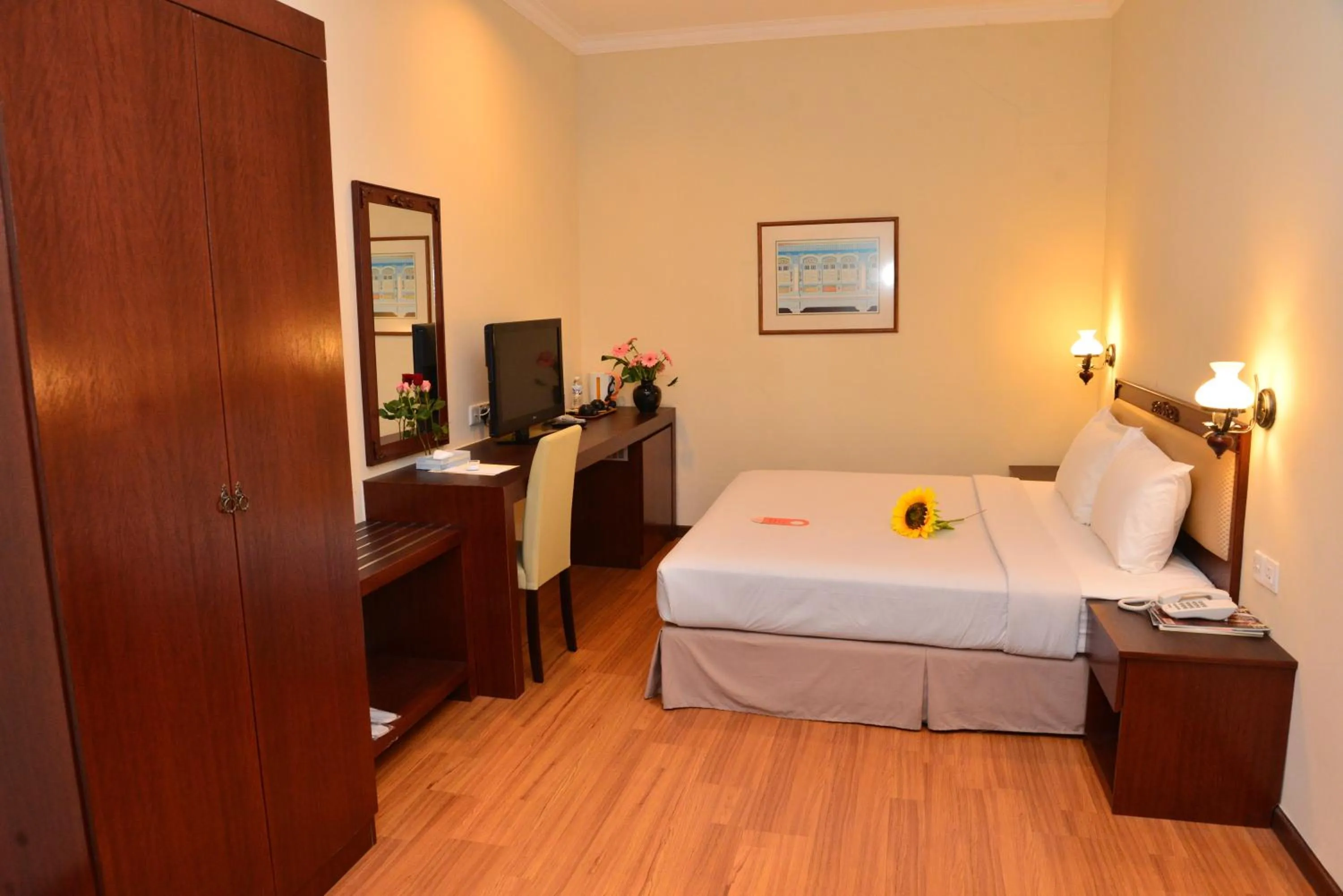 Bed in Cheng Ho Hotel