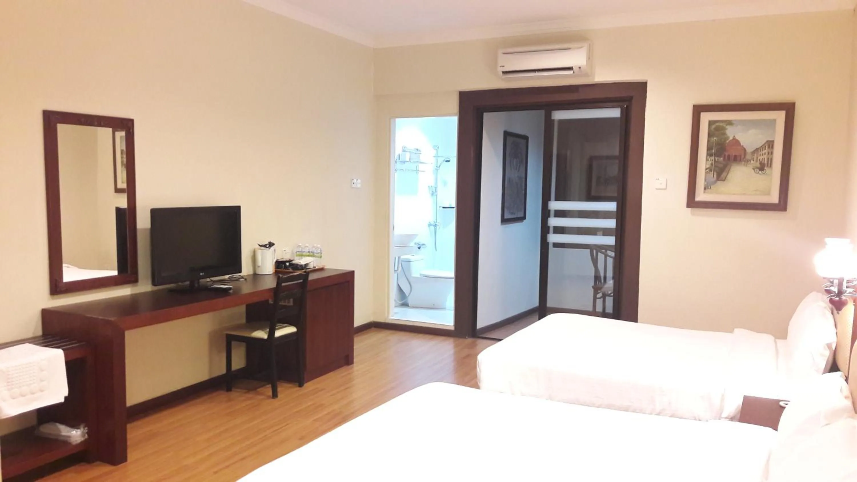 Bed in Cheng Ho Hotel