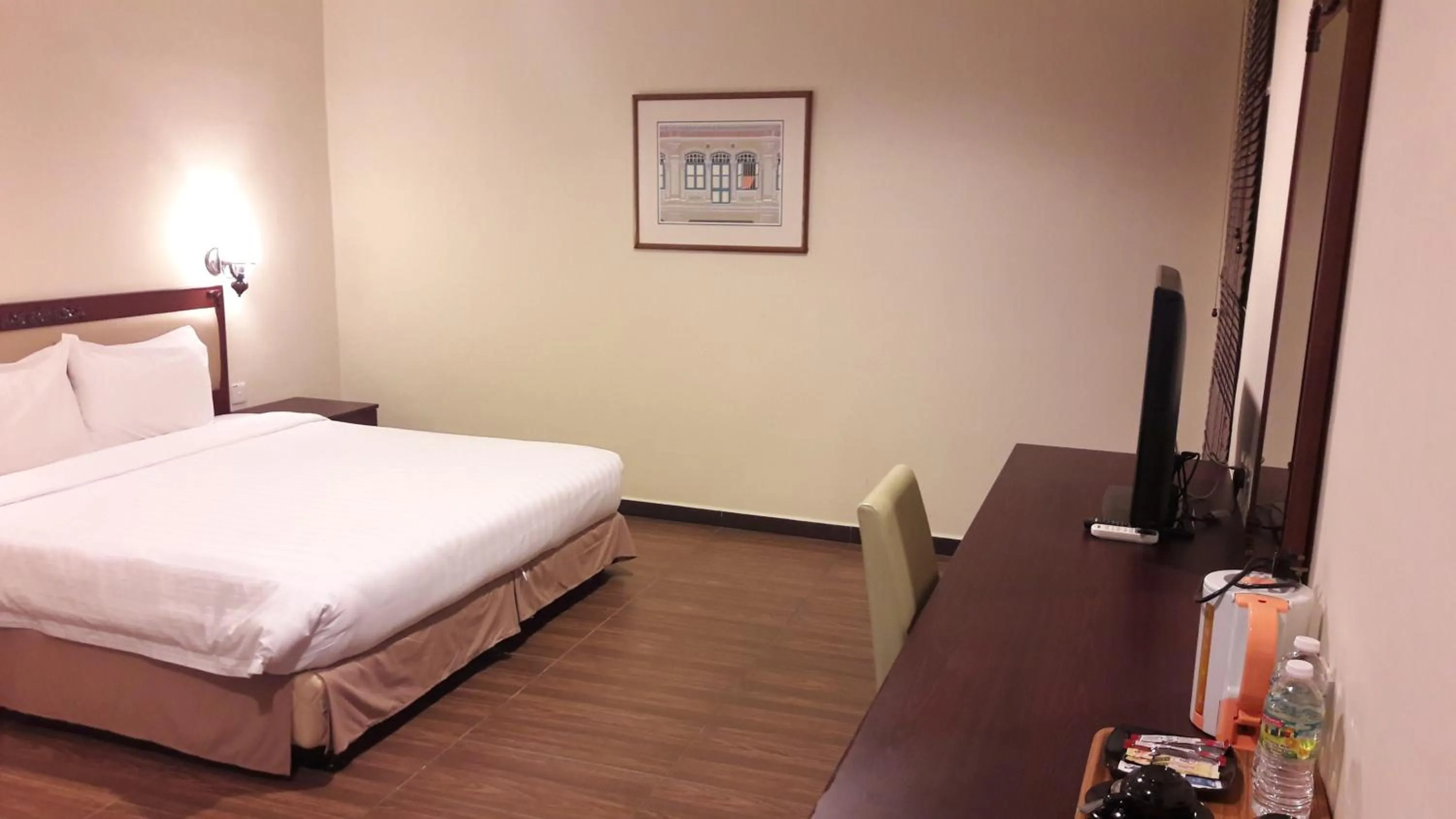 Bed in Cheng Ho Hotel