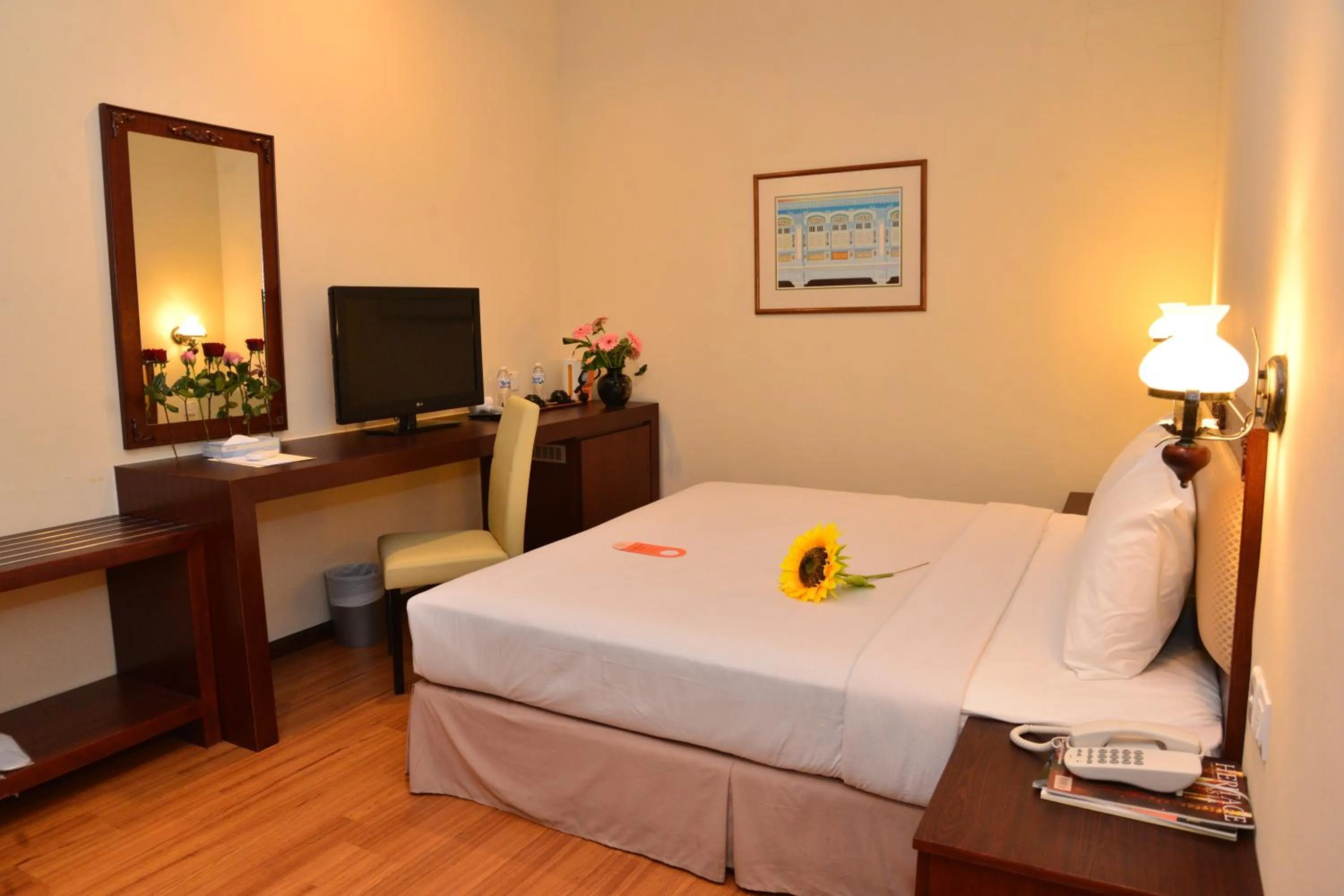 Bed in Cheng Ho Hotel