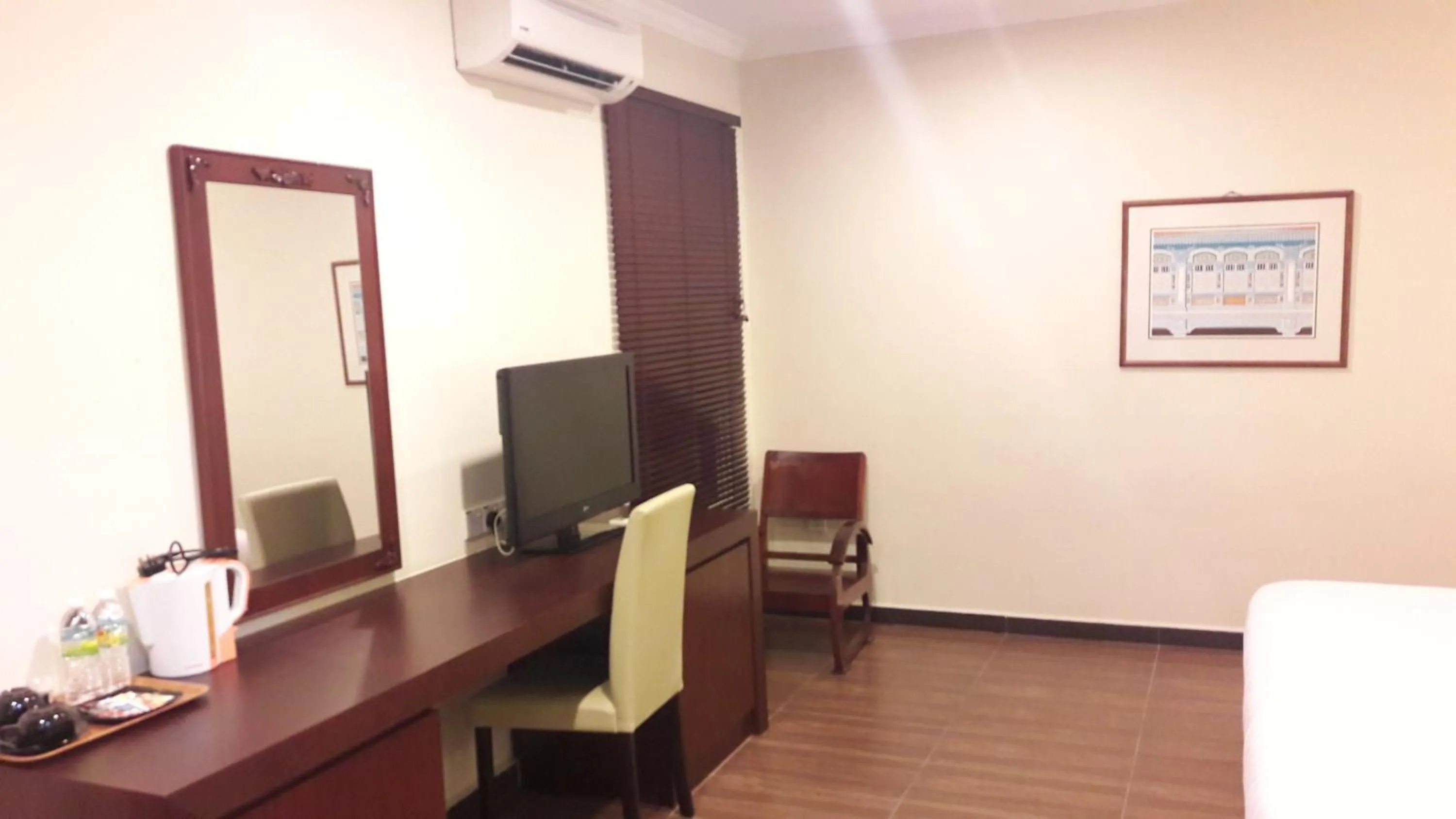 Bed in Cheng Ho Hotel