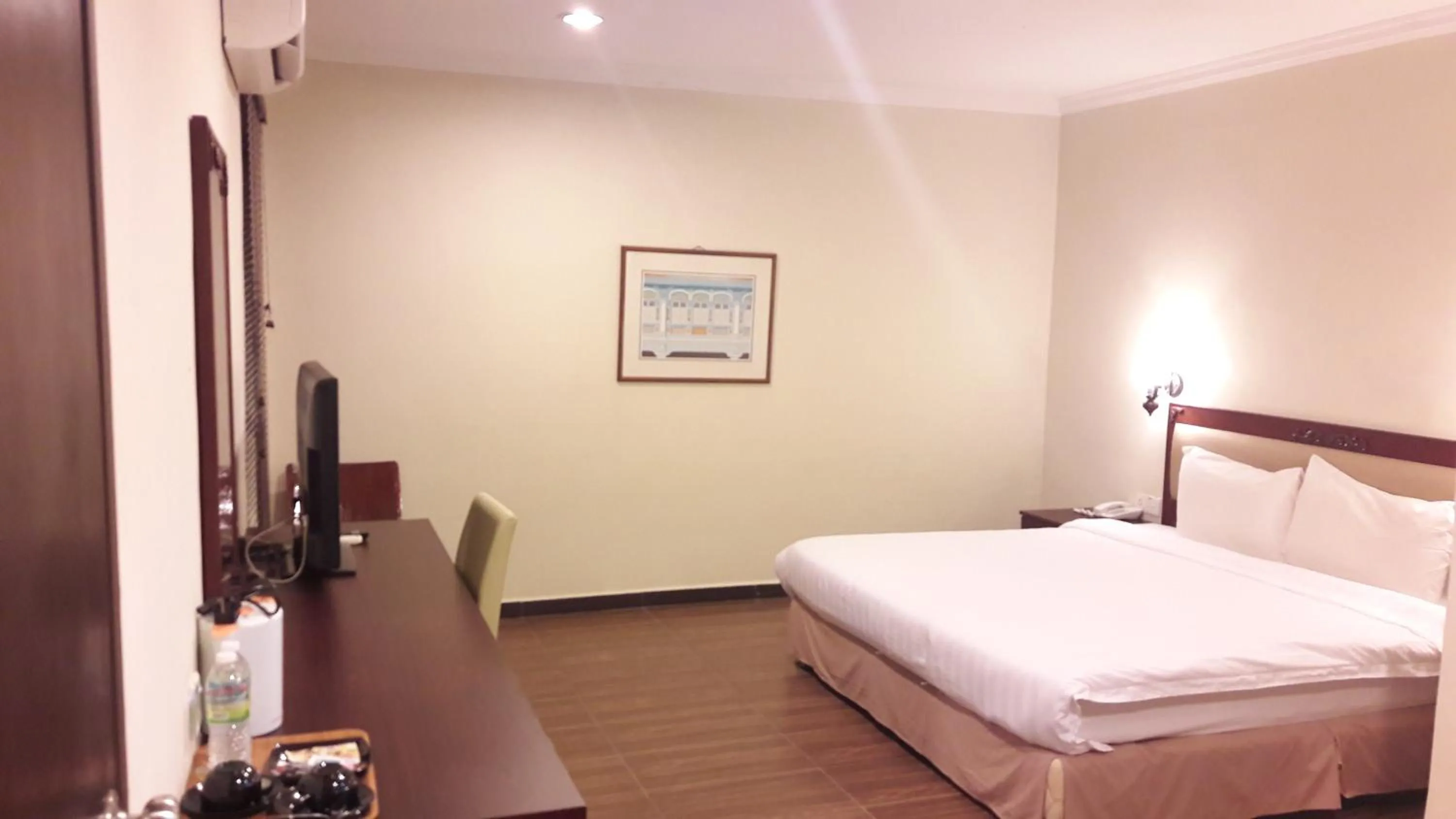 Bed in Cheng Ho Hotel